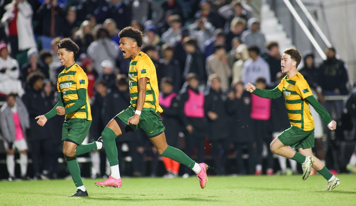 Vermont players react to winning the game during the NCAA College Cup semifinal match between the Denver Pioneers and the Vermont Catamounts on December 13, 2024 at WakeMed Soccer Park in Cary, NC.