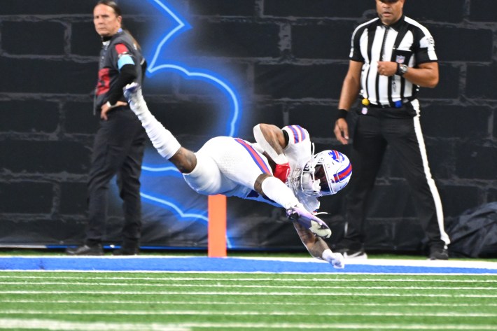 Buffalo Bills running back Ray Davis (22) catches a short pass and dives into the end zone during the Detroit Lions versus the Buffalo Bills game on Sunday December 15, 2024 at Ford Field in Detroit.