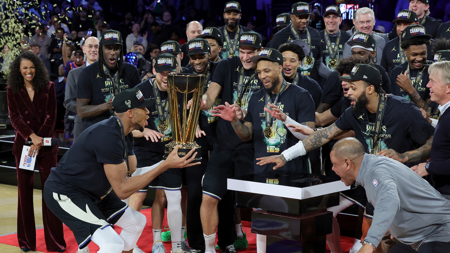 Giannis Antetokounmpo #34 of the Milwaukee Bucks lifts the championship trophy as he celebrates with teammates after the Bucks defeated the Oklahoma City Thunder 97-81 to win the championship game of the Emirates NBA Cup at T-Mobile Arena on December 17, 2024 in Las Vegas, Nevada.