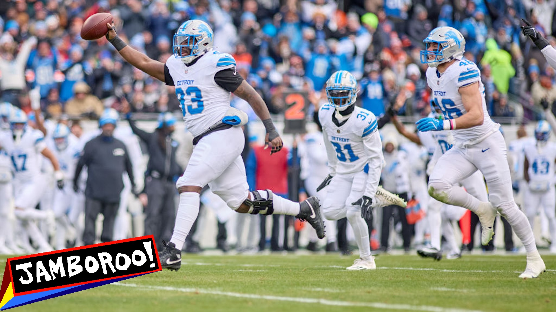 CHICAGO, IL - DECEMBER 22: Detroit Lions defensive end Josh Paschal (93) recovers a fumble and celebrates with teammates in action during a game between the Detroit Lions and the Chicago Bears on December 22, 2024 at Soldier Field in Chicago, IL.