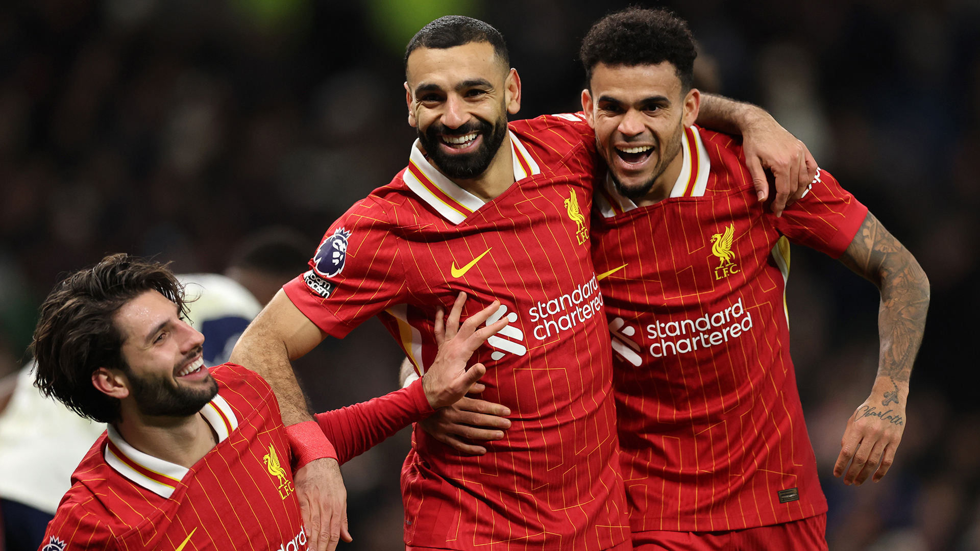 Mohamed Salah of Liverpool celebrates after scoring a goal to make it 1-4 during the Premier League match between Tottenham Hotspur FC and Liverpool FC at Tottenham Hotspur Stadium on December 22, 2024 in London, England.