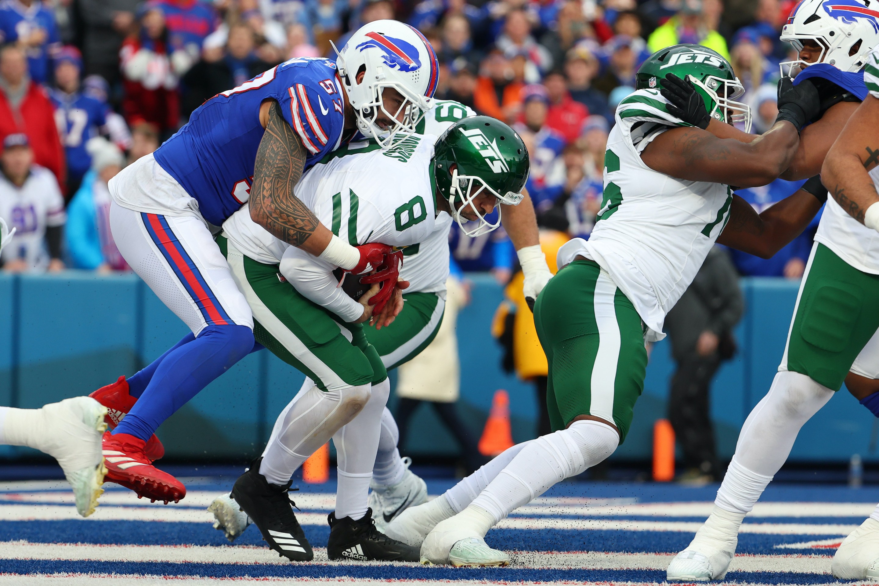 Aaron Rodgers is sacked in the end zone by a Bills defensive player