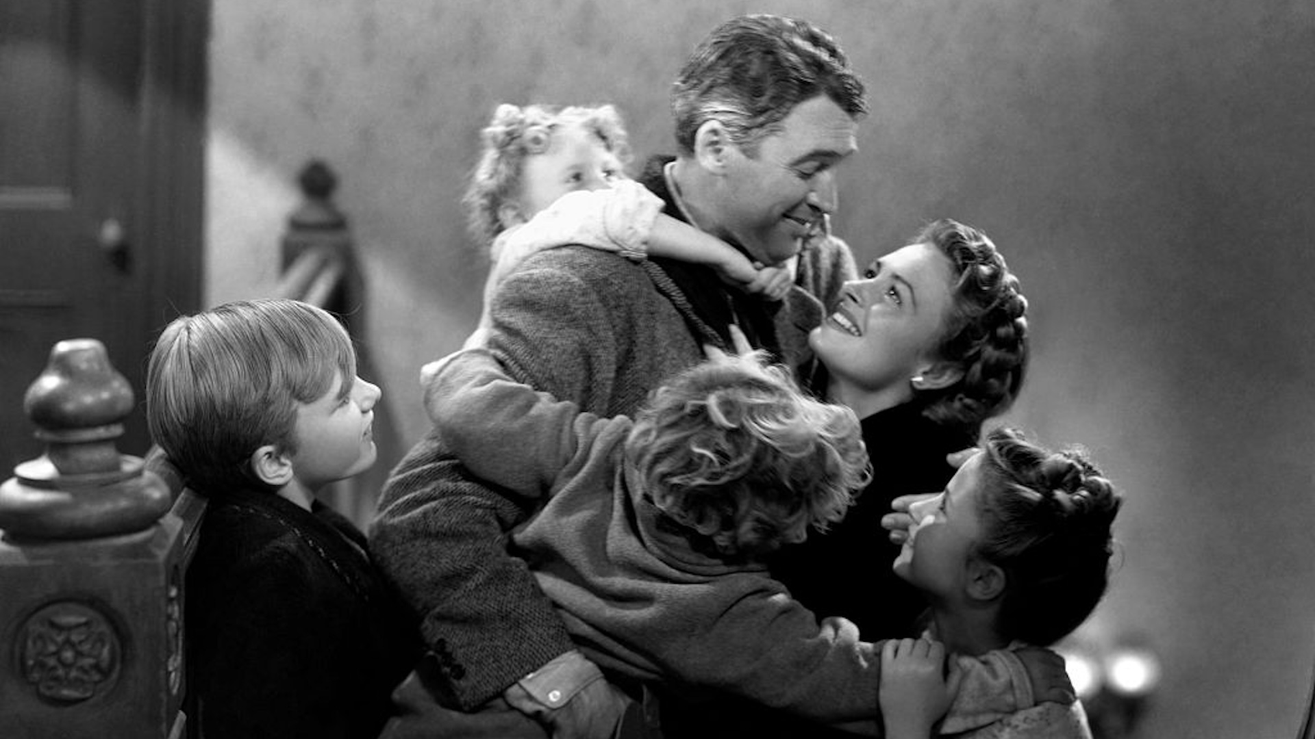 Clockwise from top: James Stewart, Donna Reed, Carol Coombs, Jimmy Hawkins, Larry Simms and Karolyn Grimes.