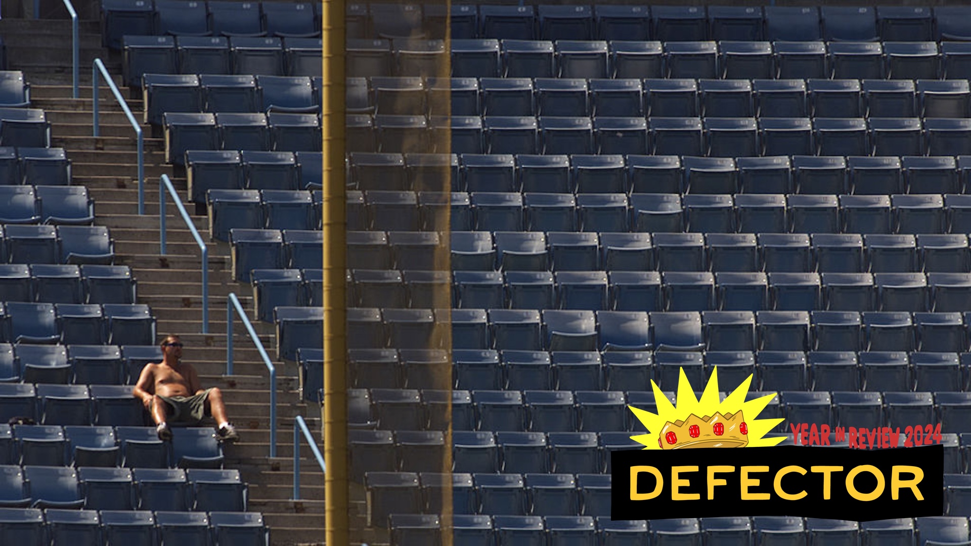 Richard Hartog –– – A fan lands himself just foul in the upper level leftfield seats as he keeps cool and takes in the Dodger/Seattle interleague game, Sunday afternoon at Dodger Stadium.