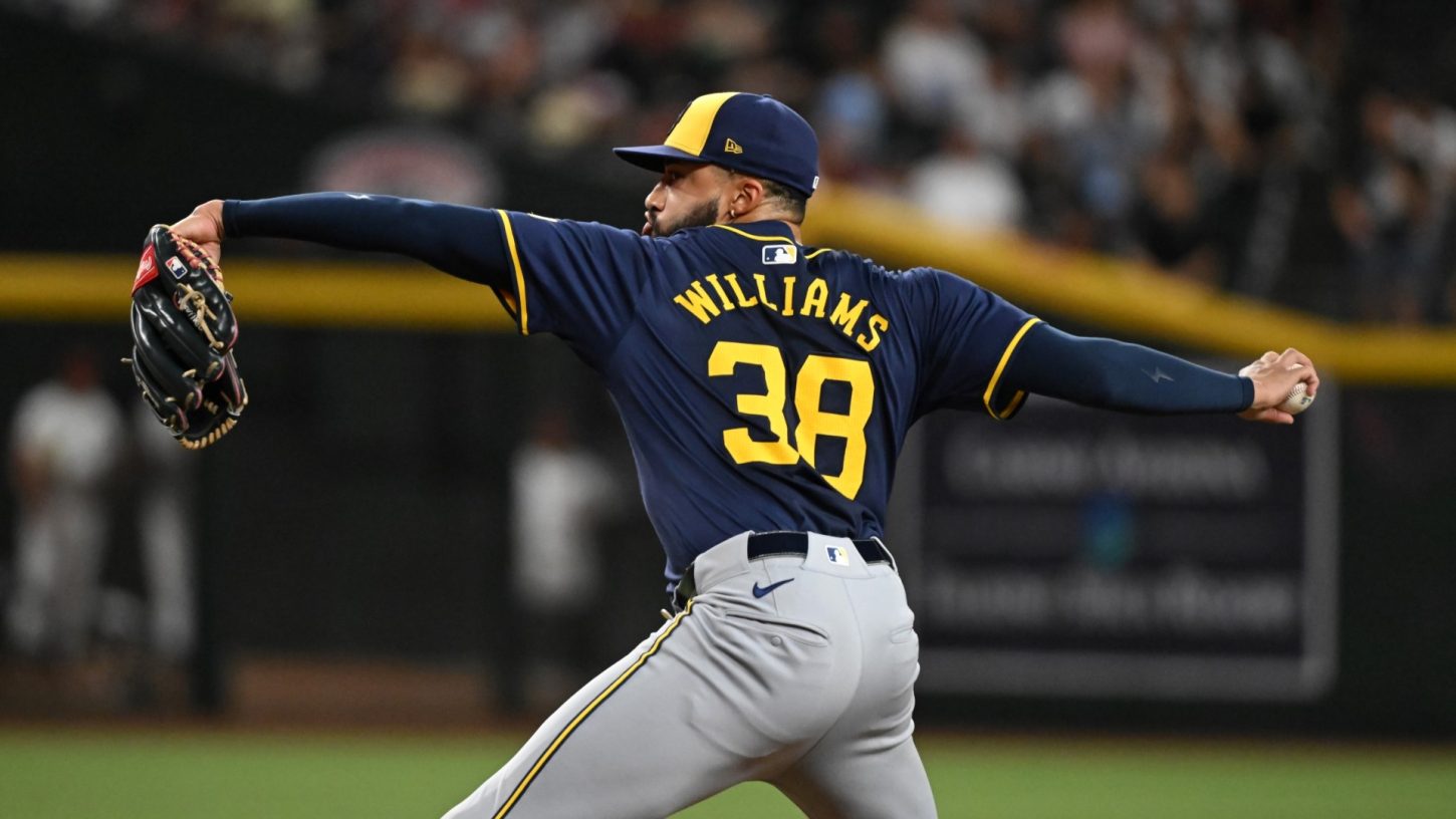 Devin Williams #38 of the Milwaukee Brewers delivers a ninth inning pitch.