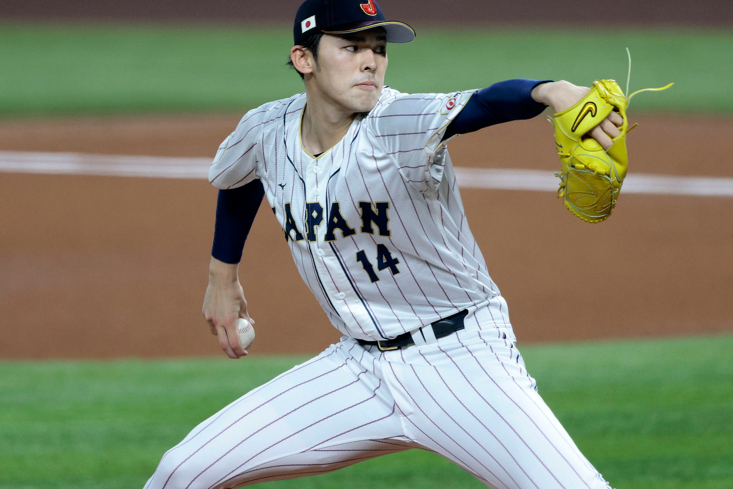 of Team Japan pitches during the 2023 World Baseball Classic Semifinal game against Team Mexico in 2023.