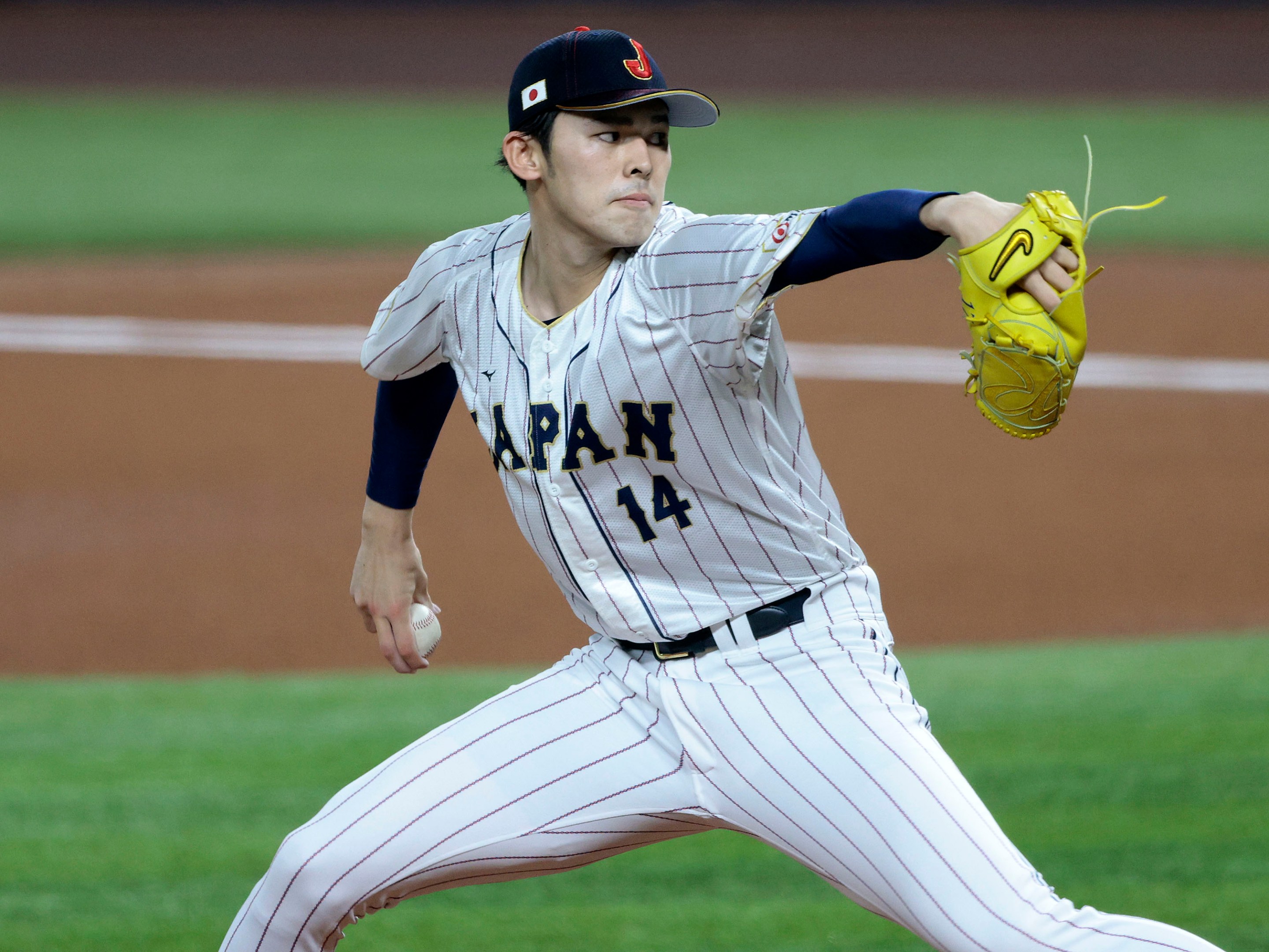 of Team Japan pitches during the 2023 World Baseball Classic Semifinal game against Team Mexico in 2023.