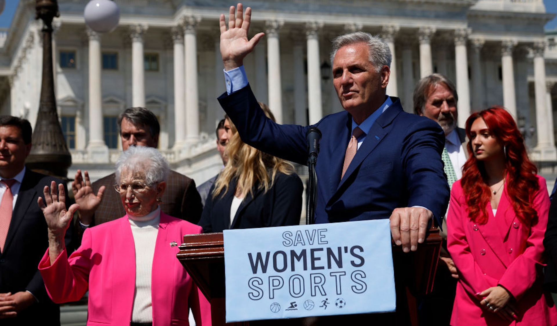 WASHINGTON, DC - APRIL 20: Speaker of the House Kevin McCarthy (R-CA) (C) and Rep. Virginia Foxx (R-VA) (L) raise their hands when asked if they know a transgender woman during an event to celebrate the House passing The Protection Of Women And Girls In Sports Act outside the U.S. Capitol on April 20, 2023 in Washington, DC. President Joe Biden has promised to veto the legislation, which defines sex as 'based solely on a person’s reproductive biology and genetics at birth' and would ban all transgender women and girls from competing in female school sports.