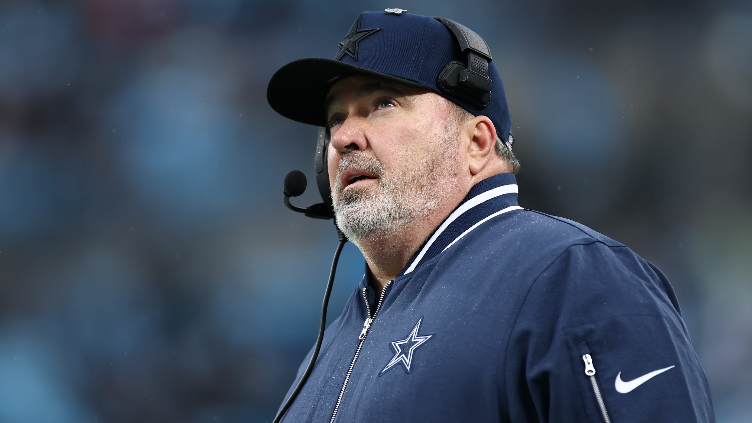 Head coach Mike McCarthy of the Dallas Cowboys looks on during the fourth quarter against the Carolina Panthers at Bank of America Stadium on December 15, 2024.