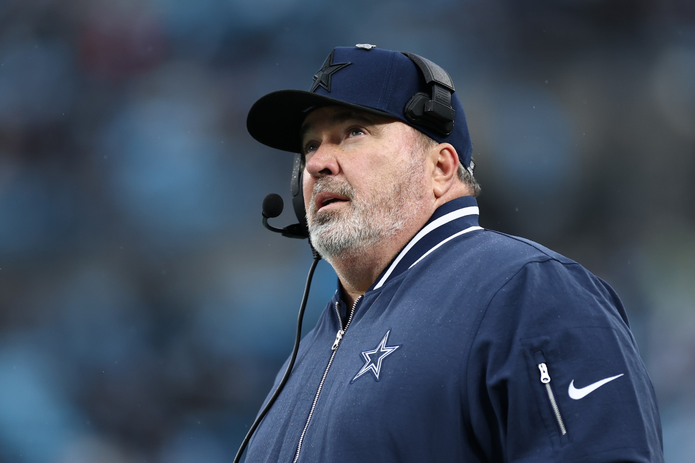 Head coach Mike McCarthy of the Dallas Cowboys looks on during the fourth quarter against the Carolina Panthers at Bank of America Stadium on December 15, 2024.