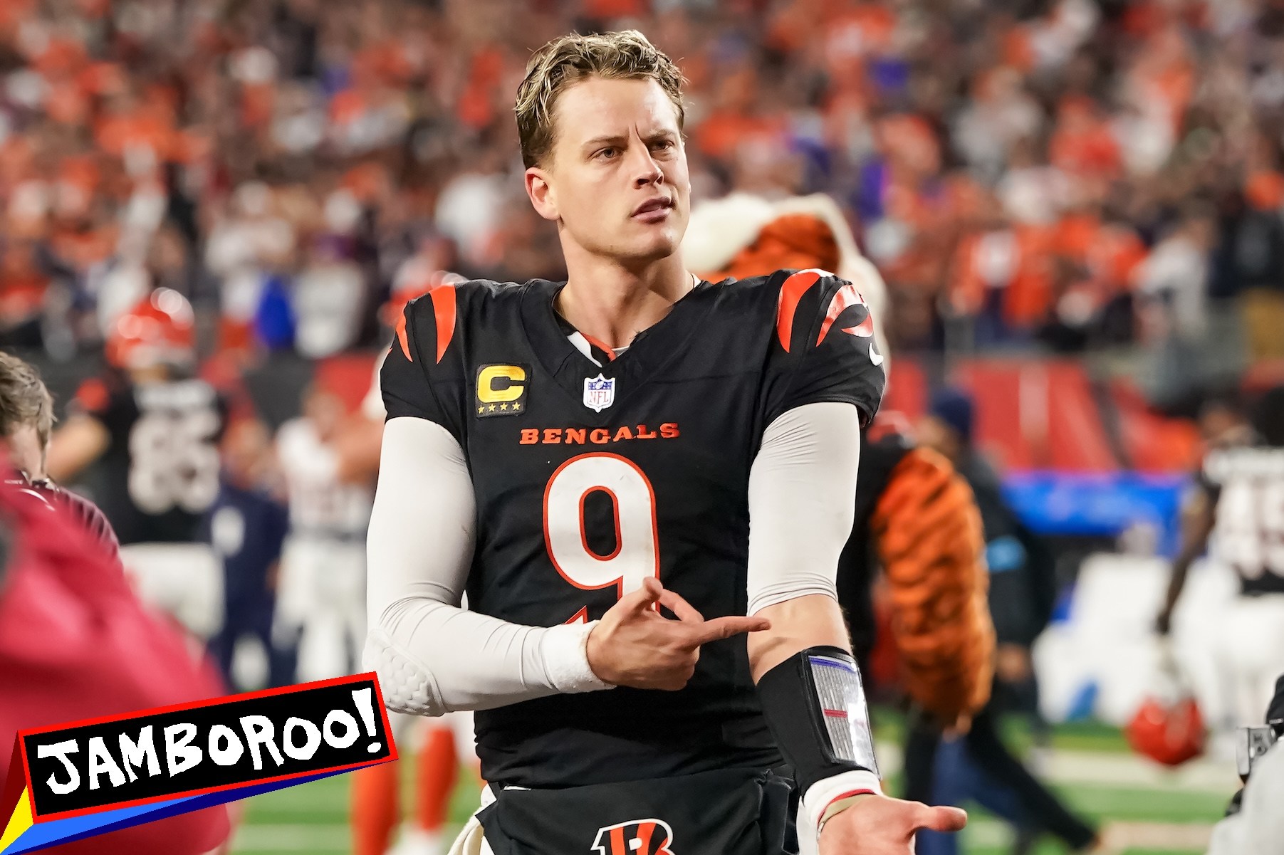 CINCINNATI, OHIO - DECEMBER 28: Joe Burrow #9 of the Cincinnati Bengals celebrates after beating the Denver Broncos 30-24 in overtime at Paycor Stadium on December 28, 2024 in Cincinnati, Ohio. (Photo by Dylan Buell/Getty Images)