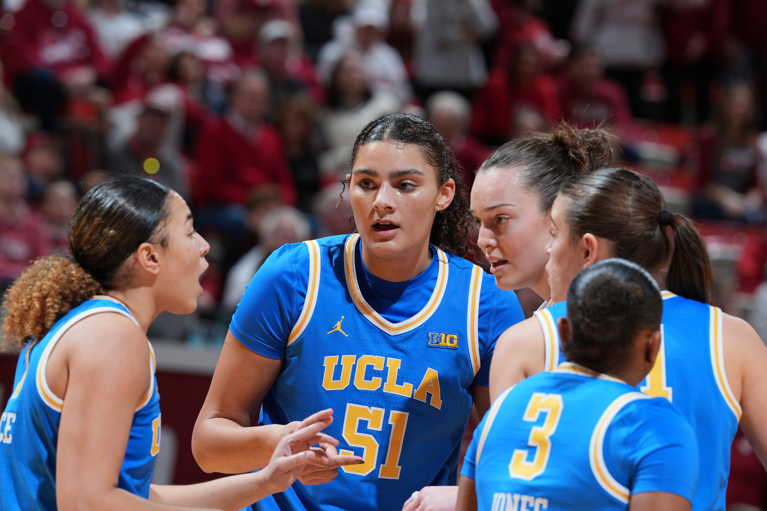 UCLA Bruins center Lauren Betts (51) huddles up with her team during a women's basketball game against the Indiana Hoosiers on January 4, 2025, at Simon Skjodt Assembly Hall in Bloomington, Indiana.