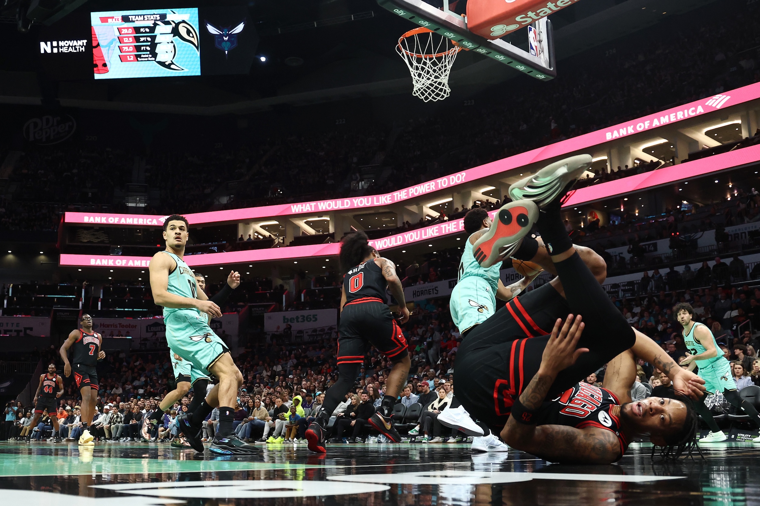 Dalen Terry of the Chicago Bulls goes to floor following a play during the first half of the game against the Charlotte Hornets.