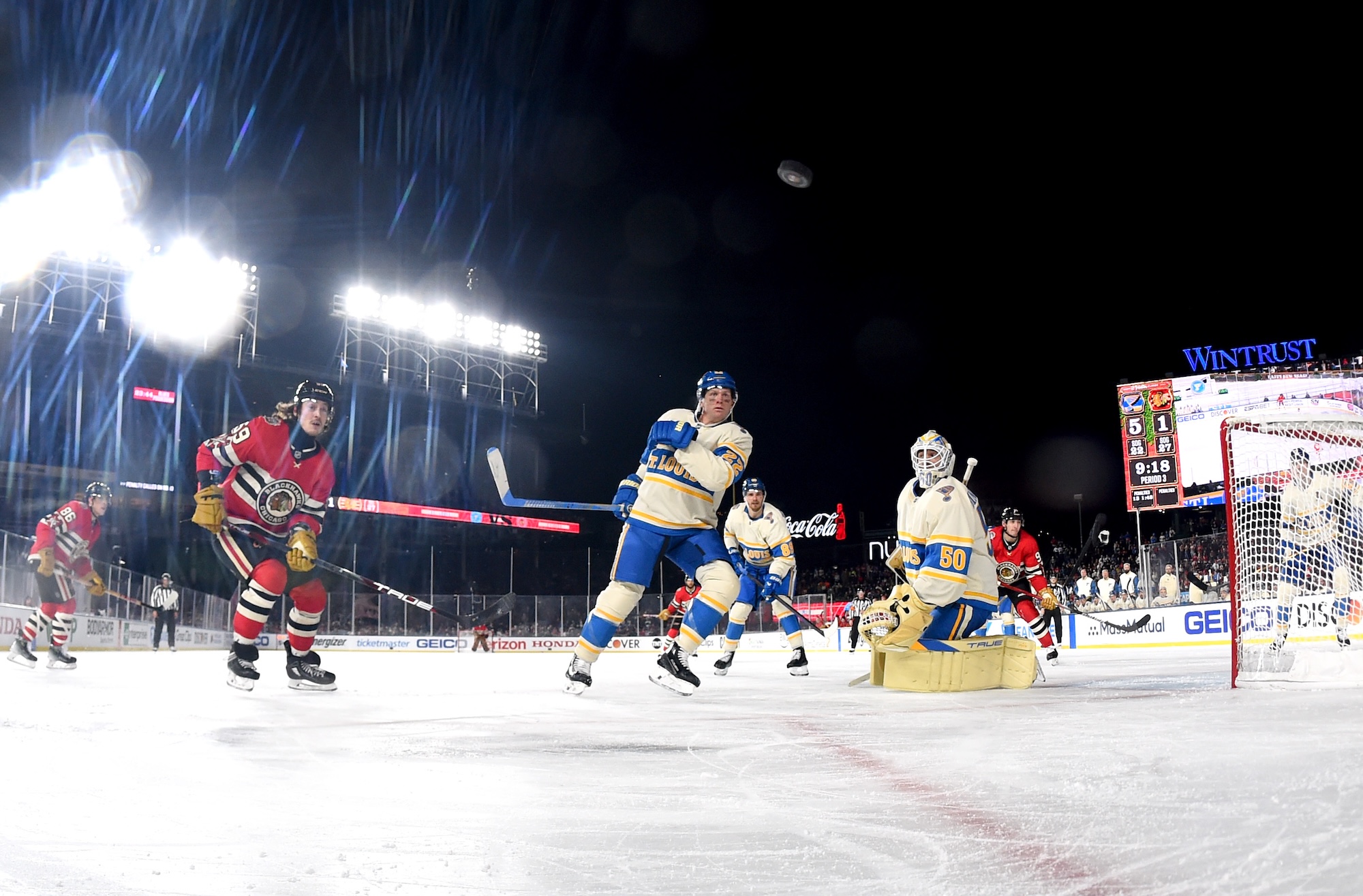 CHICAGO, ILLINOIS - DECEMBER 31: Tyler Bertuzzi #59 of the Chicago Blackhawks and Ryan Suter #22 of the St. Louis Blues look to the puck during the third period of the Discover NHL Winter Classic between the St. Louis Blues and the Chicago Blackhawks at Wrigley Field on December 31, 2024 in Chicago, Illinois. (Photo by Brian Babineau/NHLI via Getty Images)