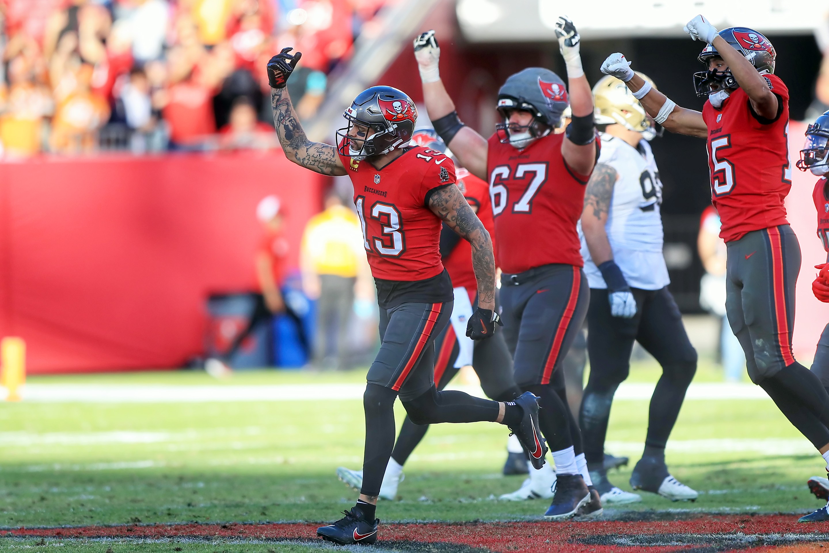 Tampa Bay Buccaneers Wide Receiver Mike Evans (13) makes a catch on the last play of the game to get his 11th 1000 yard receiving season during the game between the New Orleans Saints and the Tampa Bay Buccaneers on January 05, 2025 at Raymond James Stadium in Tampa, Florida.