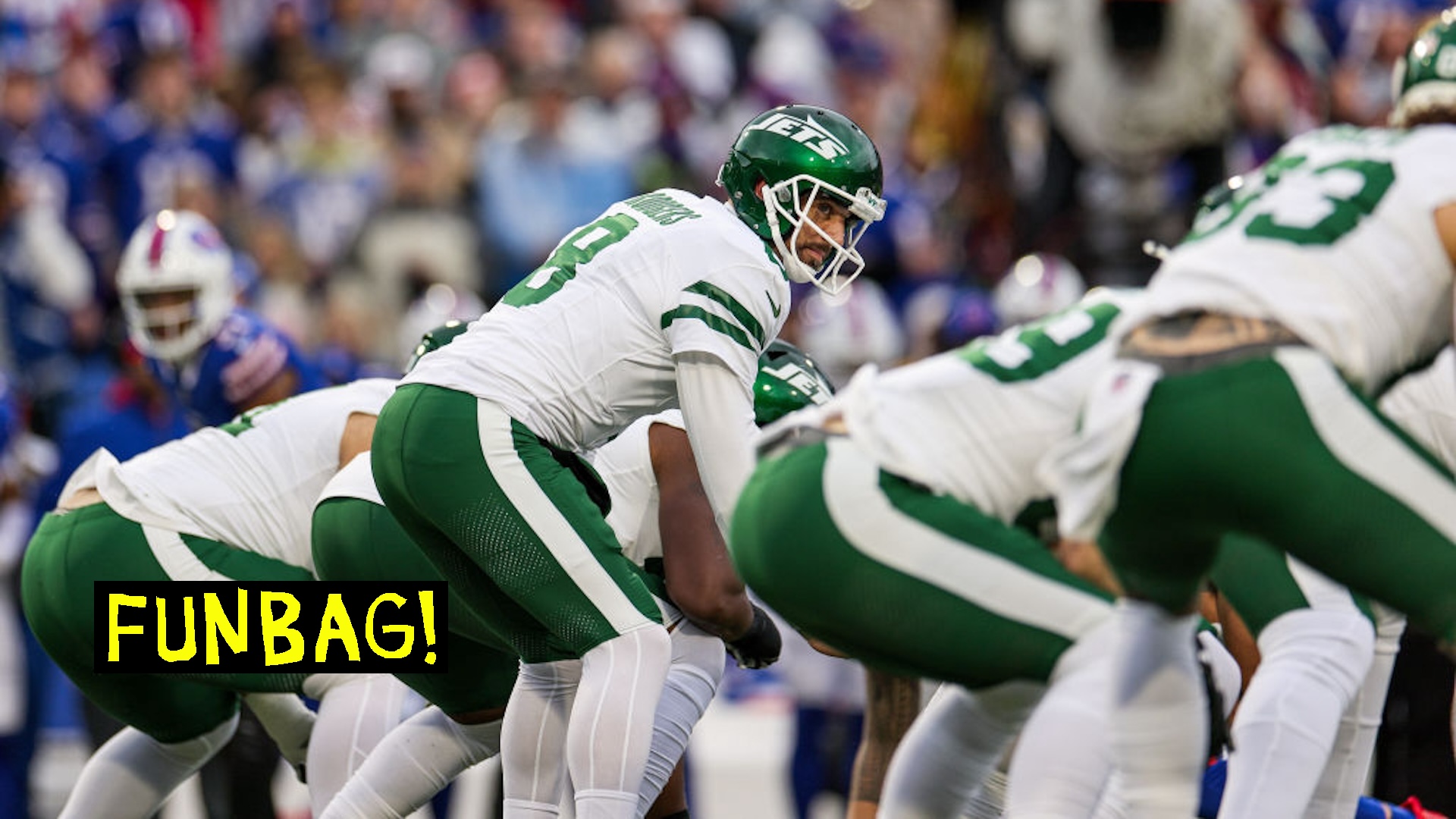 ORCHARD PARK, NEW YORK - DECEMBER 29: Aaron Rodgers #8 of the New York Jets looks on during the first quarter against the Buffalo Bills at Highmark Stadium on December 29, 2024 in Orchard Park, New York.