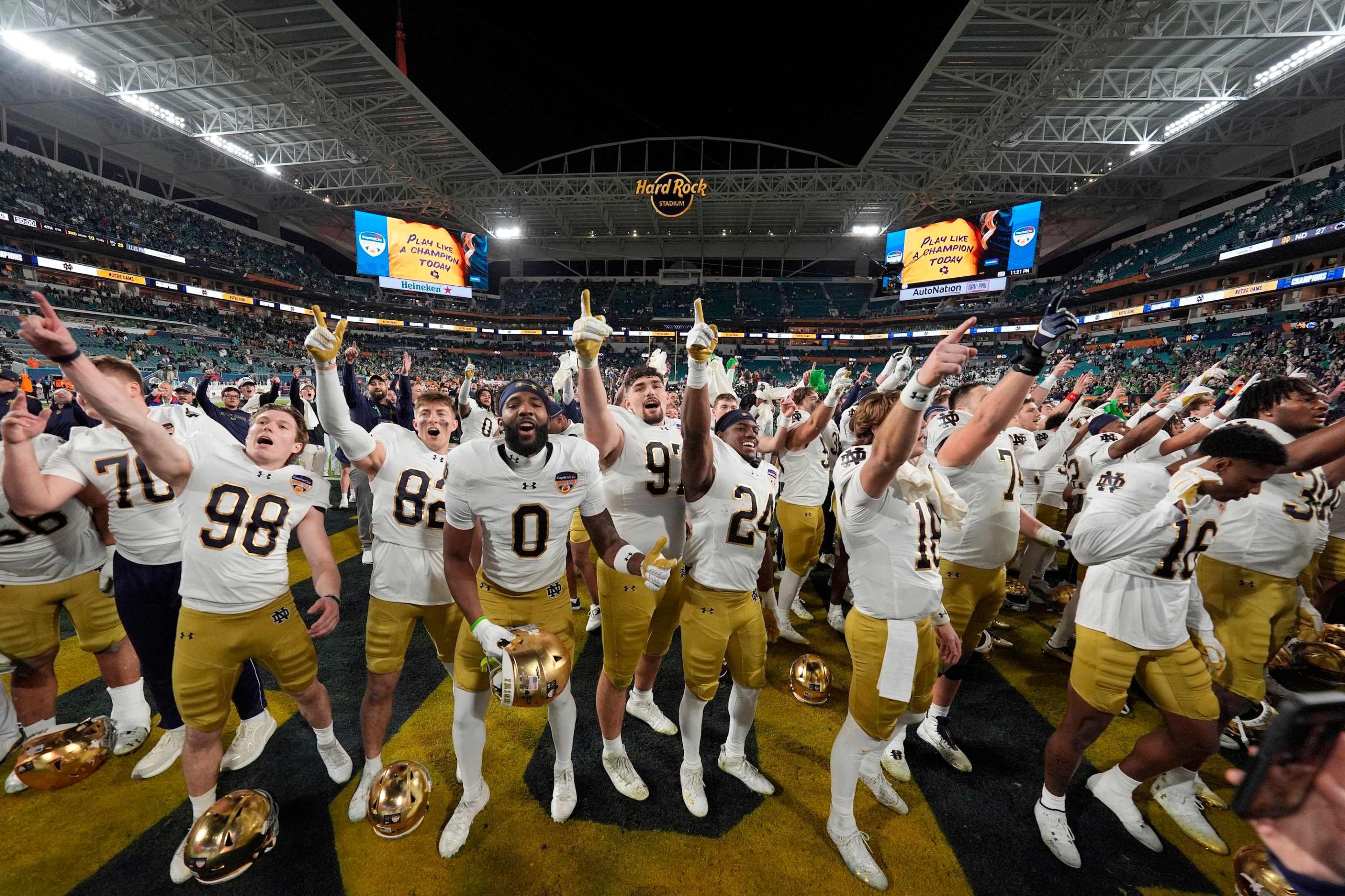 MIAMI GARDENS, FL - JANUARY 09: Notre Dame Fighting Irish players celebrate following the Penn State Nittany Lions versus Notre Dame Fighting Irish College Football Playoff Semifinal at the Capital One Orange Bowl on January 9, 2025, at Hard Rock Stadium in Miami Gardens, Florida. (Photo by Joe Robbins/Icon Sportswire via Getty Images)