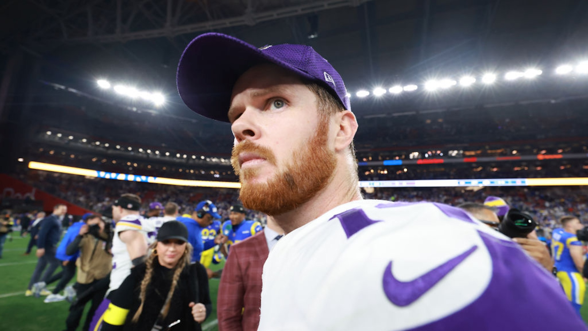 GLENDALE, ARIZONA - JANUARY 13: Sam Darnold #14 of the Minnesota Vikings looks on after a loss to the Los Angeles Rams during the NFC Wild Card Playoff at State Farm Stadium on January 13, 2025 in Glendale, Arizona.