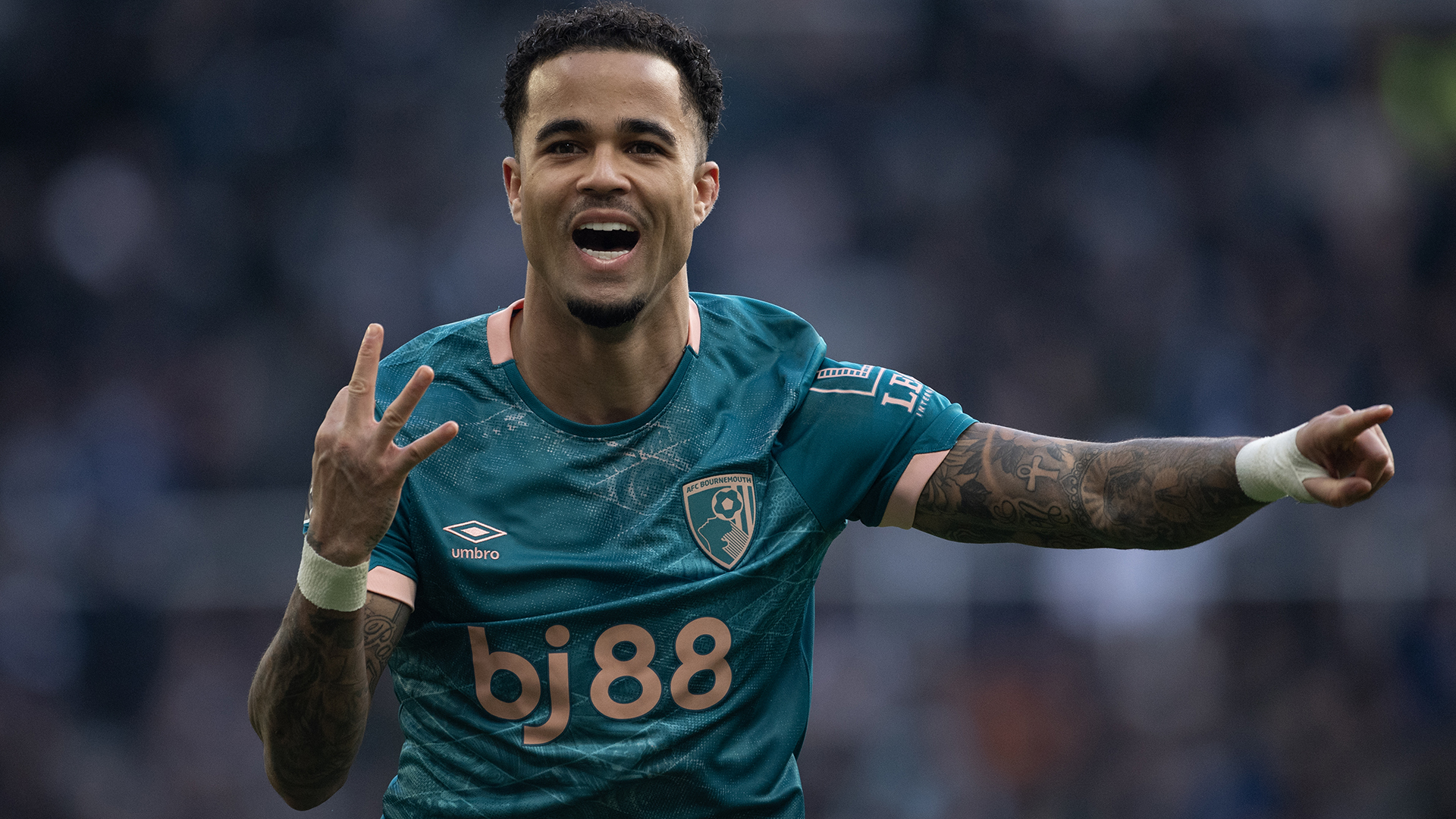 Justin Kluivert of AFC Bournemouth celebrates scoring his team's third goal and his hat-trick during the Premier League match between Newcastle United FC and AFC Bournemouth at St James' Park on January 18, 2025 in Newcastle upon Tyne, England.