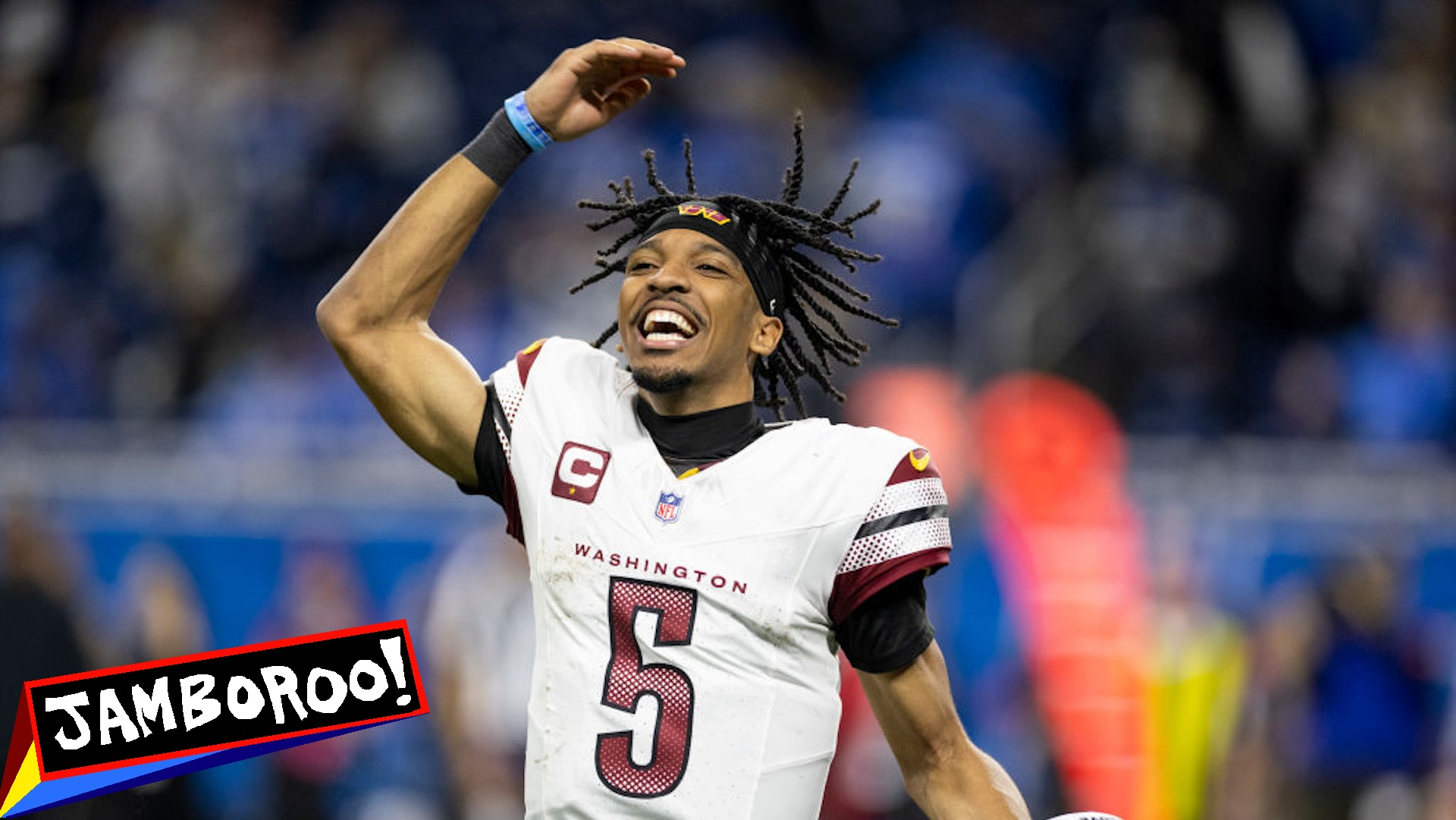 DETROIT, MICHIGAN - JANUARY 18: Jayden Daniels #5 of the Washington Commanders celebrates during an NFL Football game against the Detroit Lions at Ford Field on January 18, 2025 in Detroit, Michigan.