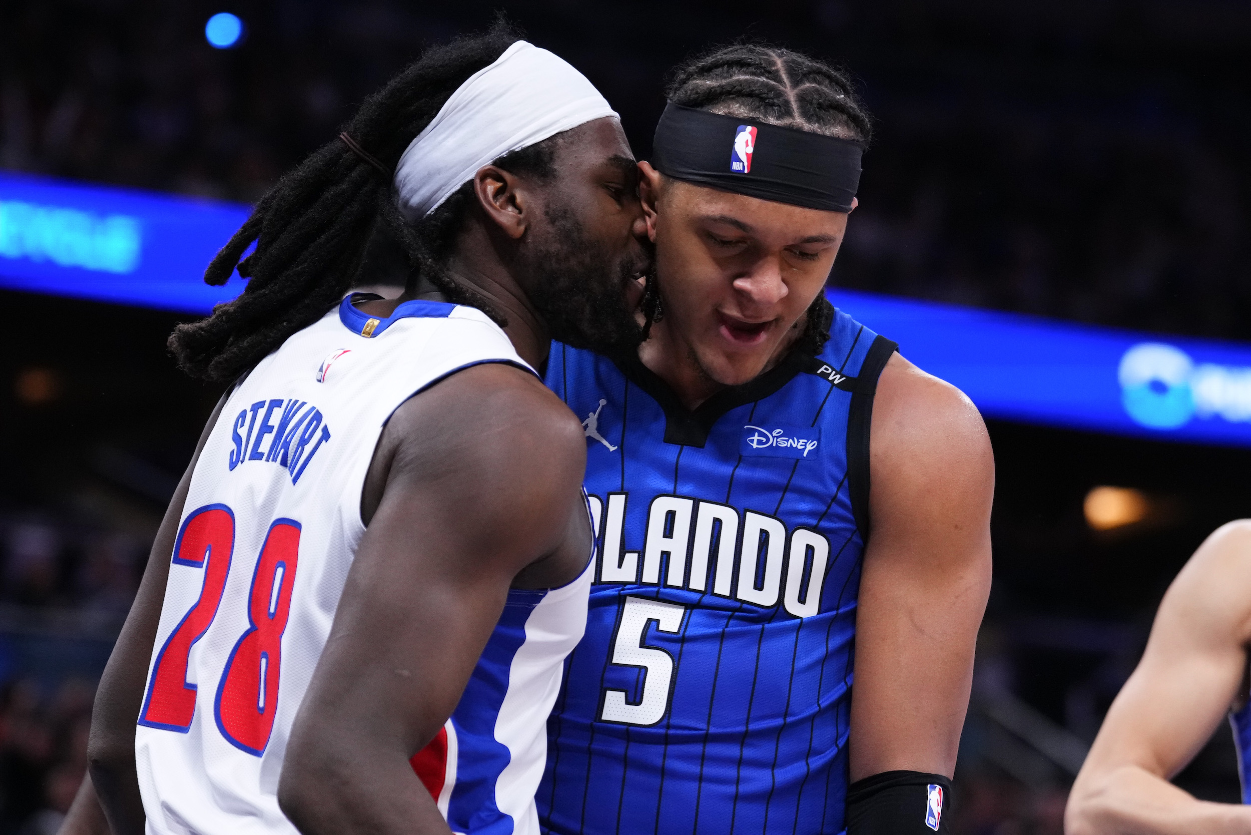 ORLANDO, FLORIDA - JANUARY 25: Isaiah Stewart #28 of the Detroit Pistons has words with Paolo Banchero #5 of the Orlando Magic during the third quarter at Kia Center on January 25, 2025 in Orlando, Florida. NOTE TO USER: User expressly acknowledges and agrees that, by downloading and or using this photograph, User is consenting to the terms and conditions of the Getty Images License Agreement. (Photo by Rich Storry/Getty Images)