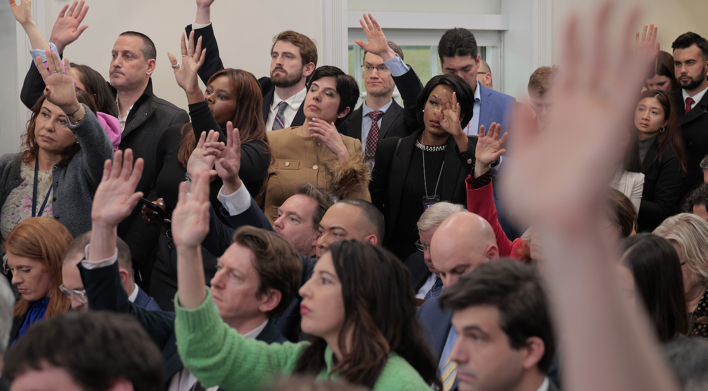 Journalists raise their hands in an attempt to ask a question of White House Press Secretary Karoline Leavitt during a news conference in the Brady Press Briefing Room at the White House on January 31, 2025 in Washington, DC.