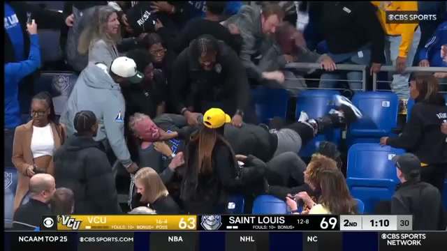 Screenshot of fans brawling in stands