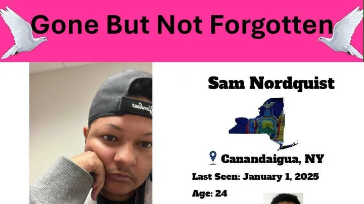 A screenshot of a graphic including a photo of Sam Nordquist, a Black transgender man with a moustache, wearing a backwards cap and staring at the camera. The top of the graphic says "Gone But Not Forgotten" with two doves on either side. And the rest of the image states: Sam Nordquist. Canandaigua, NY. Last seen: January 1, 2025. Age: 24