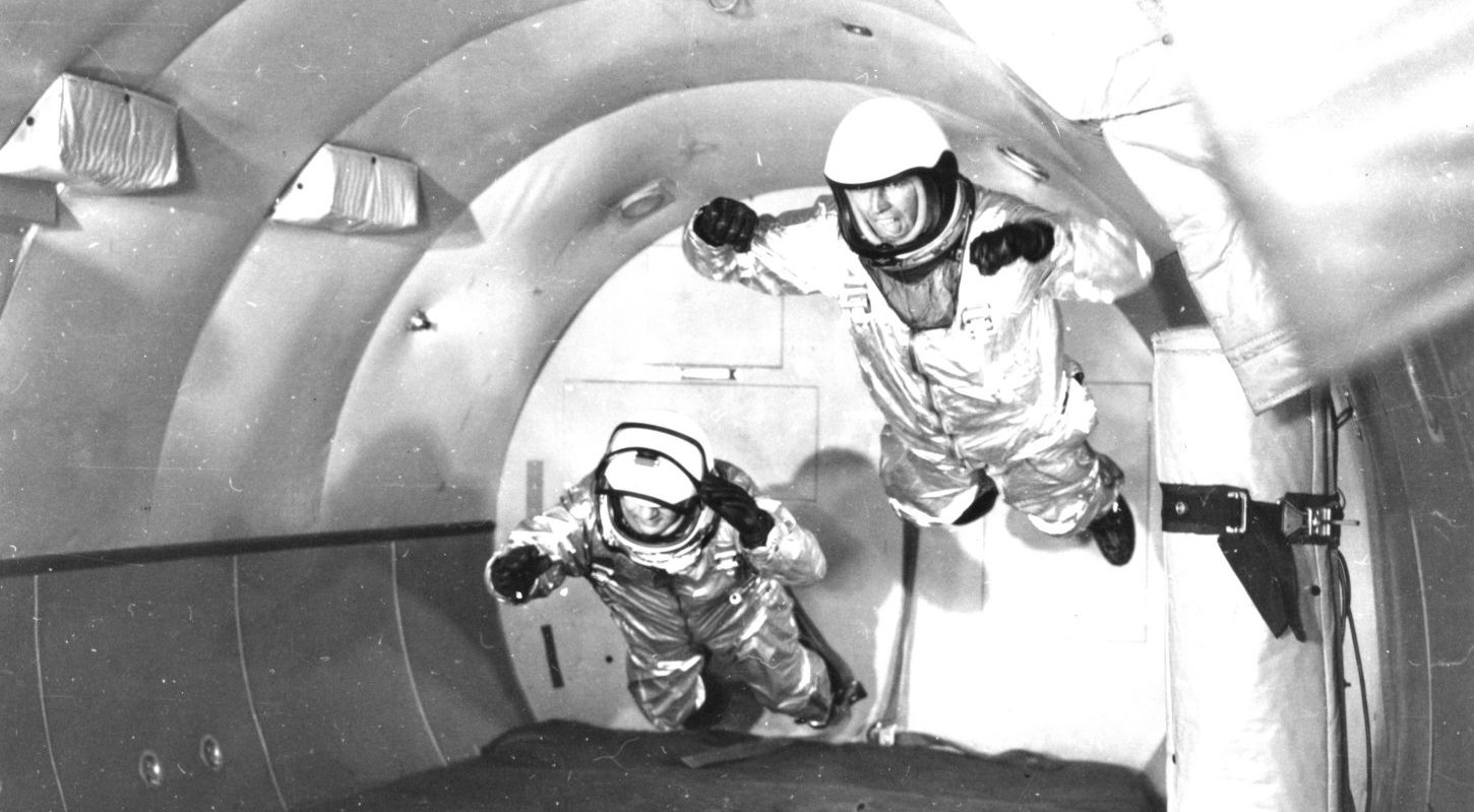 Mercury astronauts in simulated weightless flight in C-131 aircraft flying trajectory at Wright Air Development Center, Ohio, 1959.
