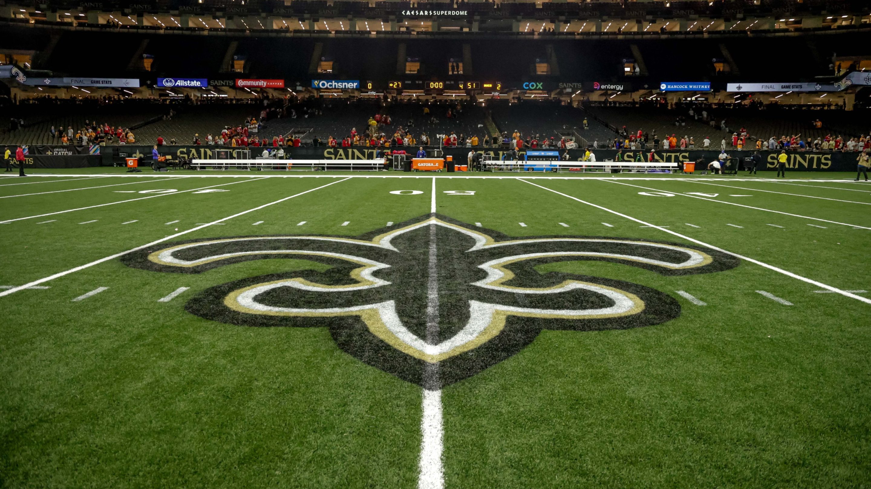 An interior view of the field showing the New Orleans Saints logo.