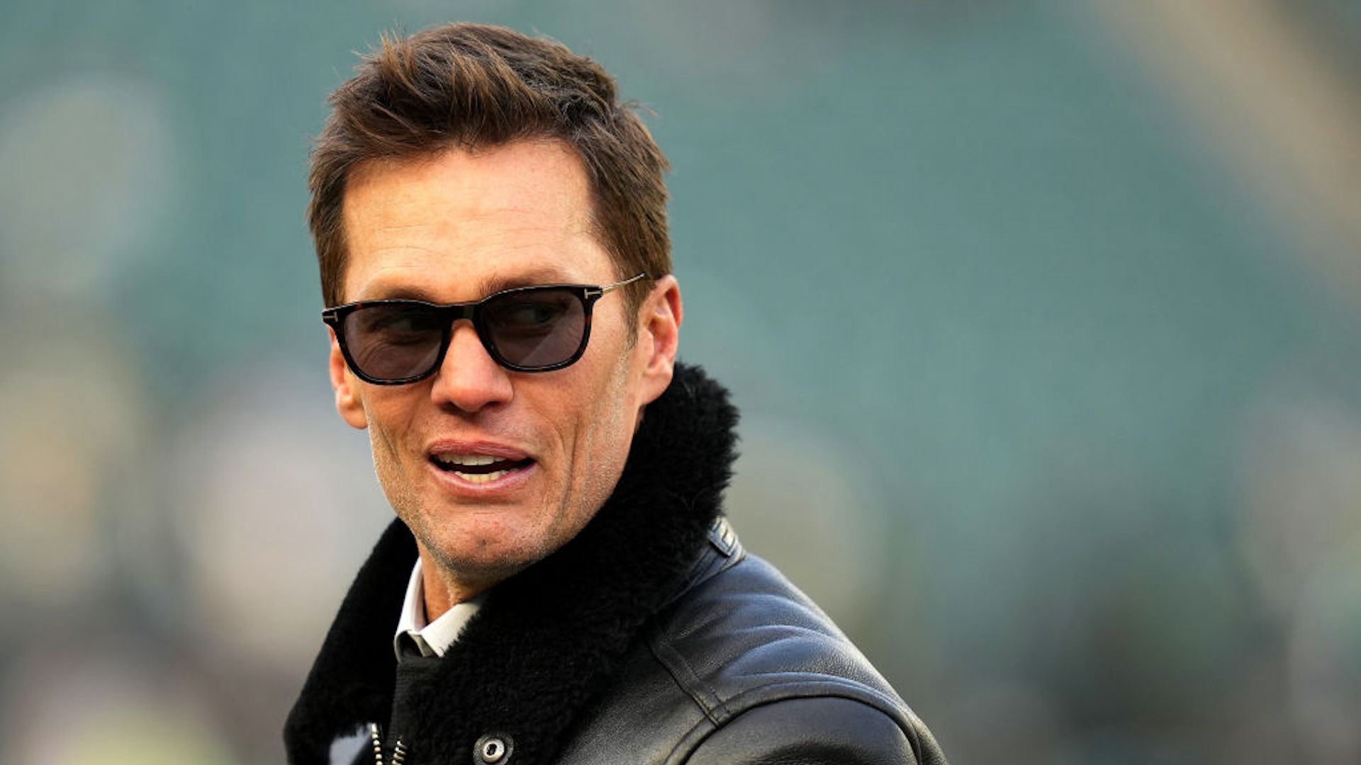 PHILADELPHIA, PENNSYLVANIA - JANUARY 12: Former NFL Player Tom Brady looks on prior to the NFC Wild Card Playoff between the Green Bay Packers and the Philadelphia Eagles at Lincoln Financial Field on January 12, 2025 in Philadelphia, Pennsylvania.