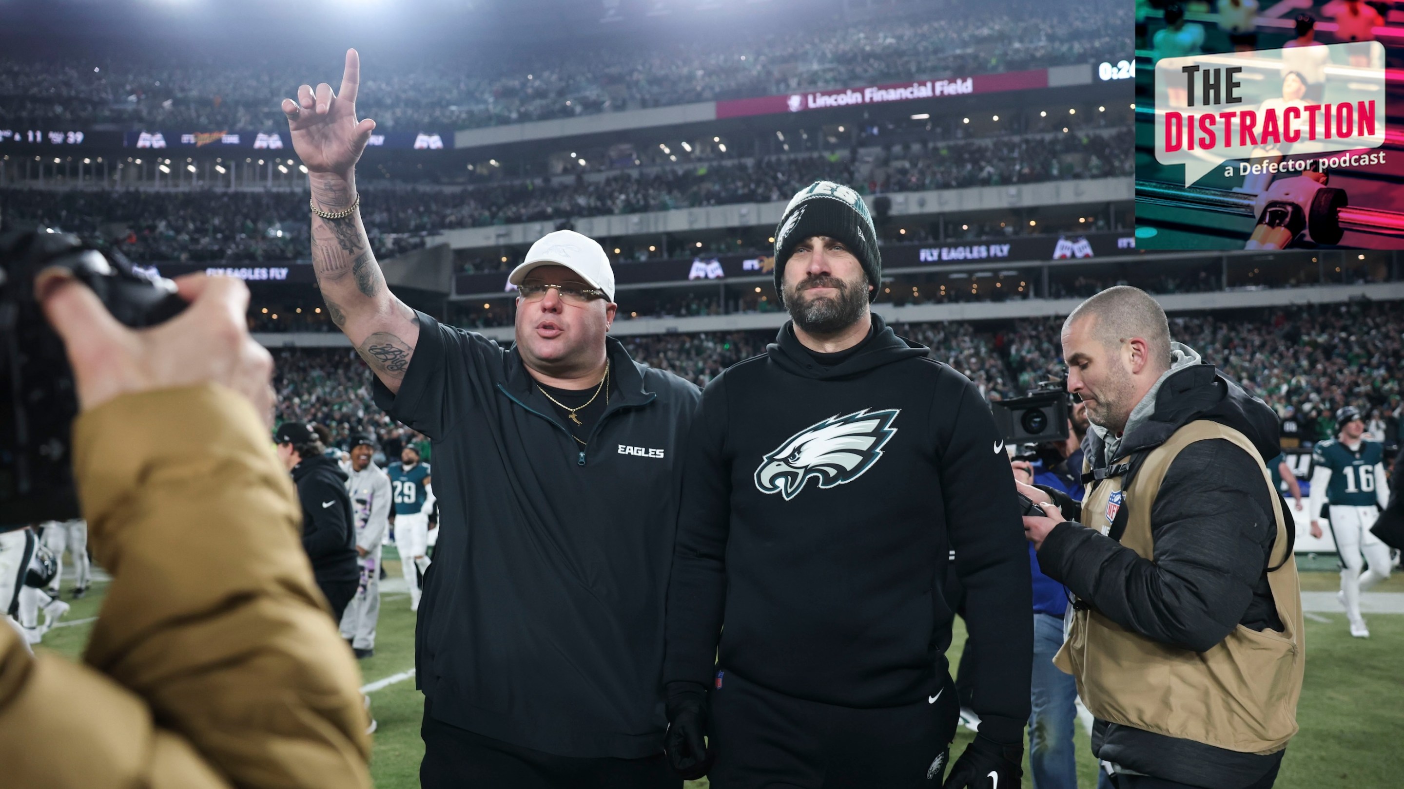 Nick Sirianni, head coach of the Philadelphia Eagles, is escorted off the field by thirsty-ass Dom DiSandro following the NFC Championship Game against the Washington Commanders at Lincoln Financial Field on January 26, 2025.