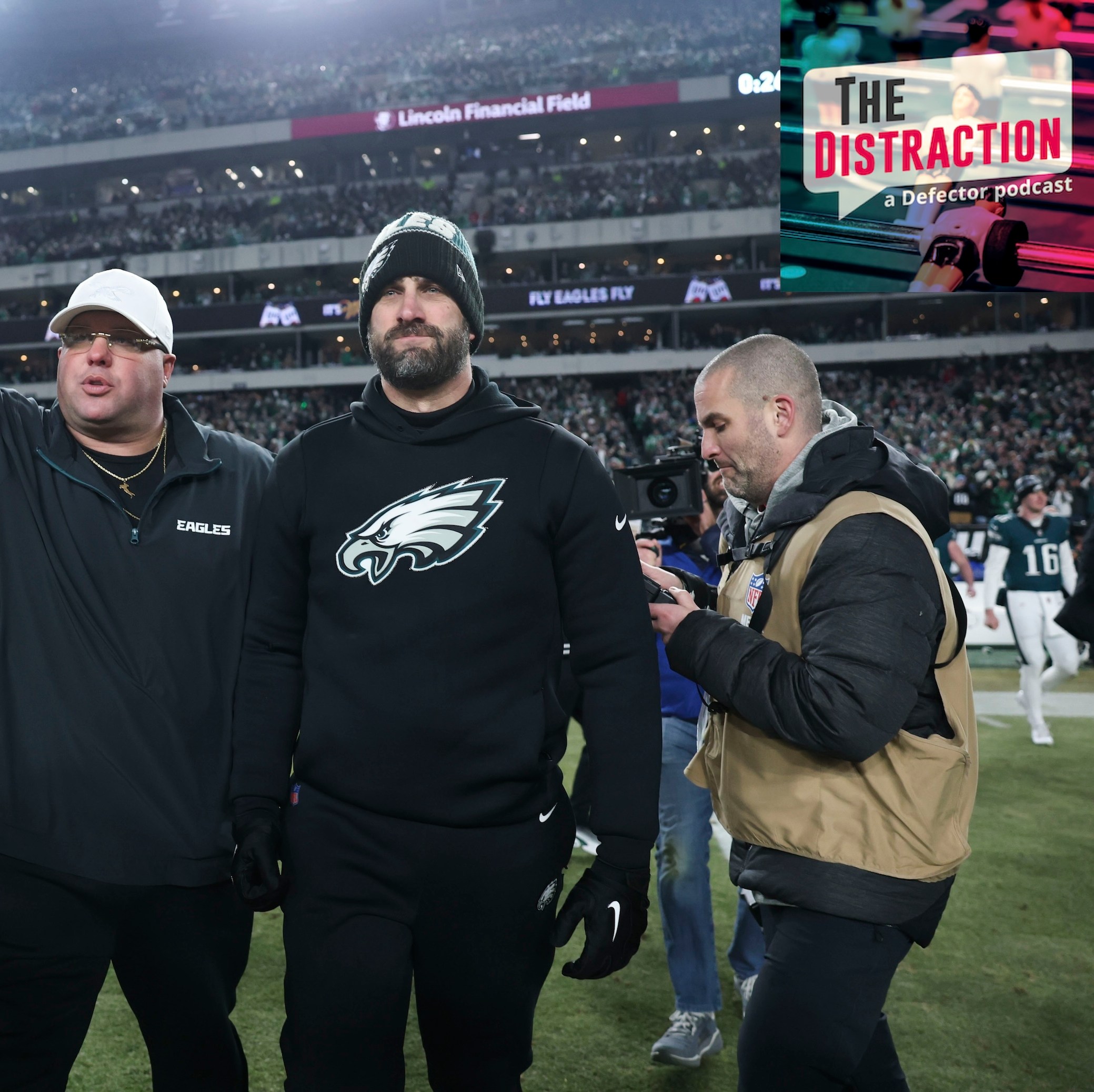Nick Sirianni, head coach of the Philadelphia Eagles, is escorted off the field by thirsty-ass Dom DiSandro following the NFC Championship Game against the Washington Commanders at Lincoln Financial Field on January 26, 2025.