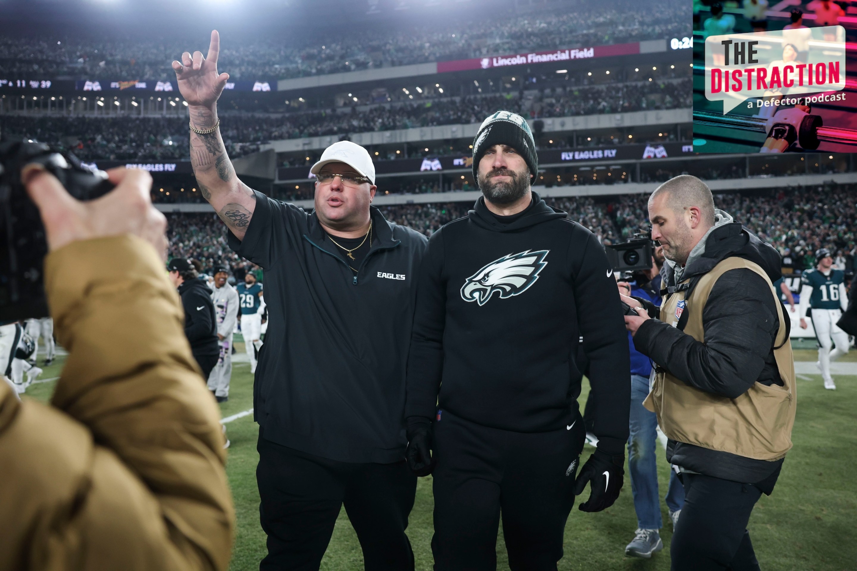 Nick Sirianni, head coach of the Philadelphia Eagles, is escorted off the field by thirsty-ass Dom DiSandro following the NFC Championship Game against the Washington Commanders at Lincoln Financial Field on January 26, 2025.