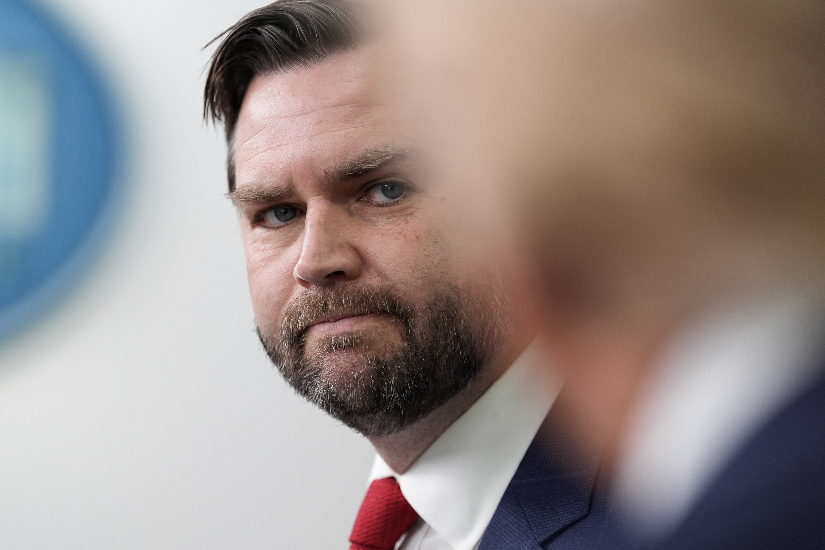 US Vice President JD Vance, standing alongside President Donald Trump (R), speaks about the mid-air crash between American Airlines flight 5342 and a military helicopter in Washington, in the Brady Press Briefing Room at the White House on January 30, 2025 in Washington, DC. Divers pulled bodies from the icy waters of Washington's Potomac river Thursday after a US military helicopter collided midair with a passenger plane carrying 64 people, with officials saying there were likely no survivors. (Photo by Oliver Contreras / AFP) (Photo by OLIVER CONTRERAS/AFP via Getty Images)