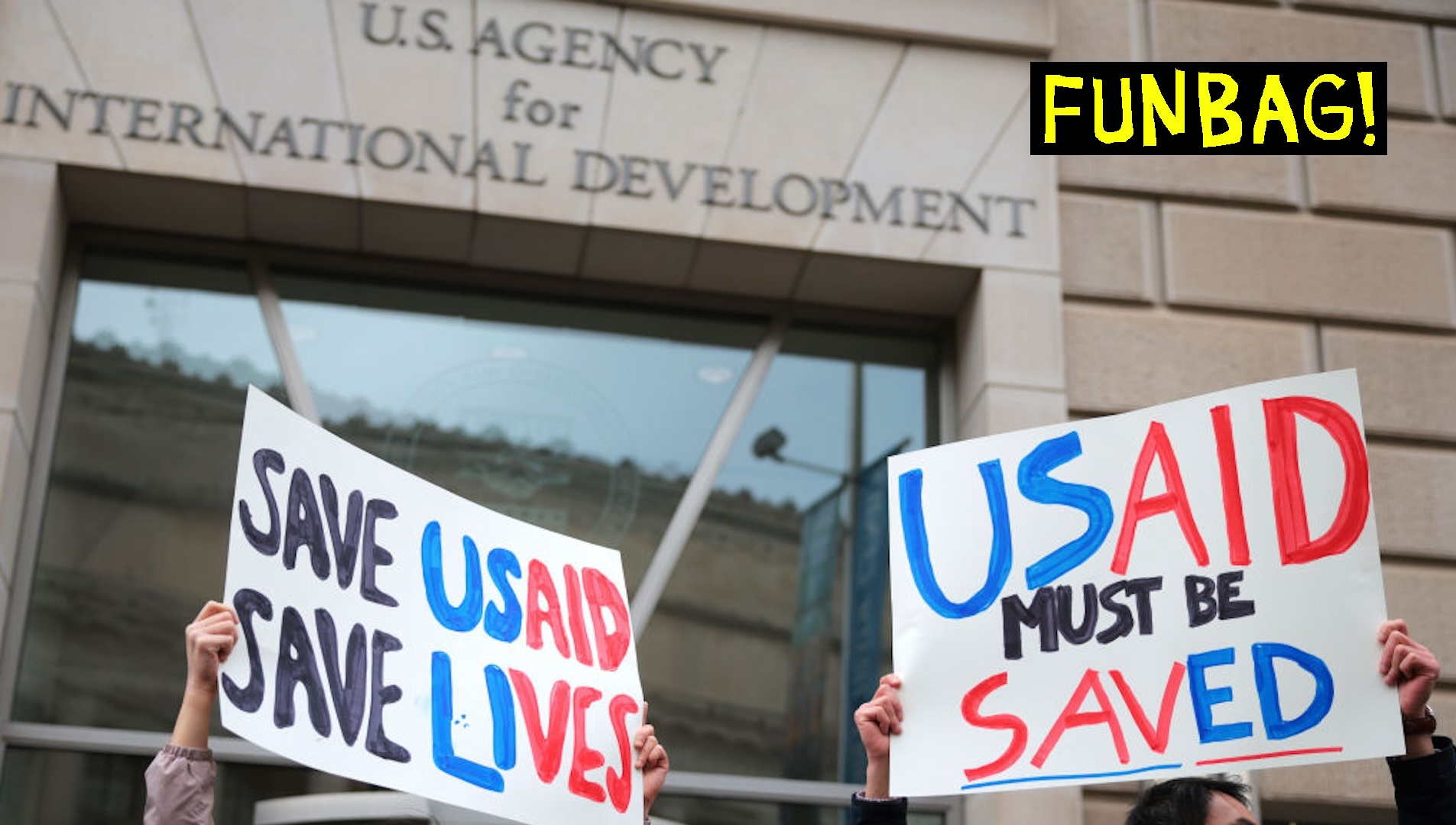 Protestors gather outside of USAID headquarters on February 03, 2025 in Washington, DC. Elon Musk, tech billionaire and head of the Department of Government Efficiency (DOGE), said in a social media post that he and U.S. President Donald Trump will shut down the foreign assistance agency.