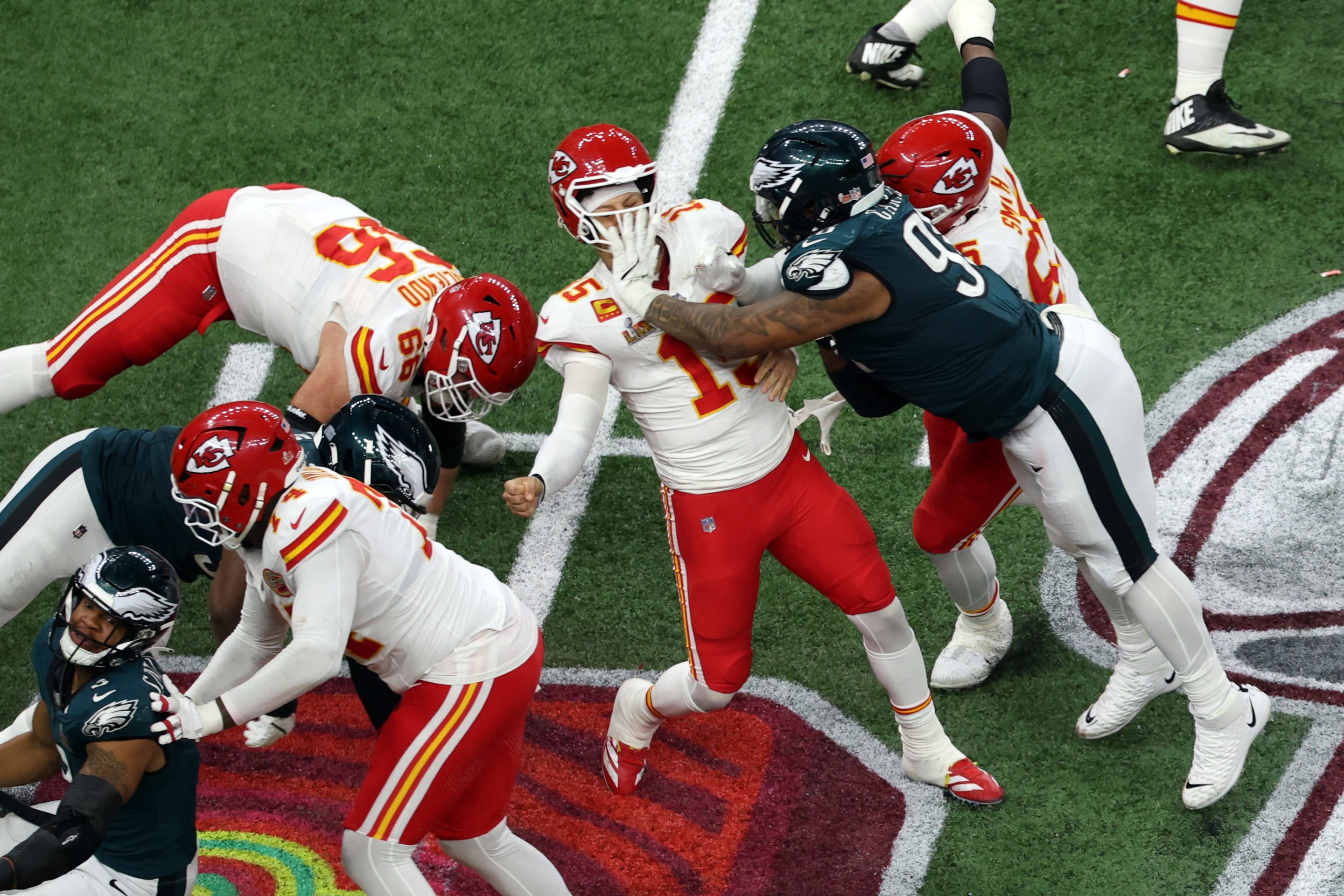 NEW ORLEANS, LA - FEBRUARY 09: DT Milton Williams #93 of the Philadelphia Eagles strips the ball away from QB Patrick Mahomes #15 of the Kansas City Chiefs for a fumble and a turnover in the fourth quarter during Super Bowl LIX between the Philadelphia Eagles and the Kansas City Chiefs on February 09, 2025, at the Caesars Superdome in New Orleans, LA. (Photo by David Buono/Icon Sportswire)