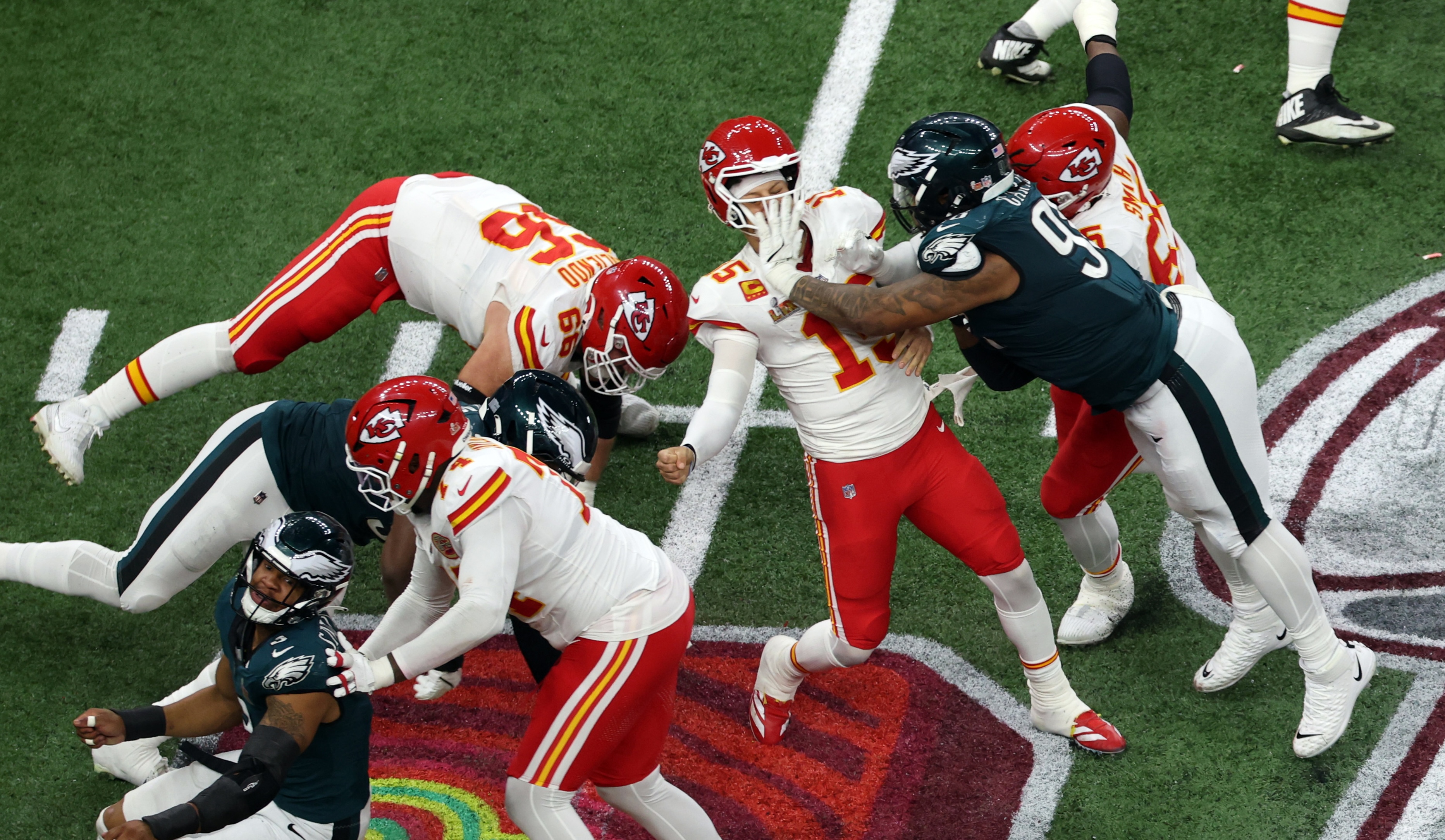 NEW ORLEANS, LA - FEBRUARY 09: DT Milton Williams #93 of the Philadelphia Eagles strips the ball away from QB Patrick Mahomes #15 of the Kansas City Chiefs for a fumble and a turnover in the fourth quarter during Super Bowl LIX between the Philadelphia Eagles and the Kansas City Chiefs on February 09, 2025, at the Caesars Superdome in New Orleans, LA. (Photo by David Buono/Icon Sportswire)