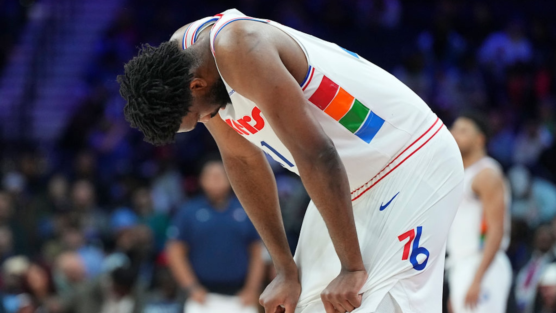 Joel Embiid #21 of the Philadelphia 76ers looks down against the Toronto Raptors in the second half at the Wells Fargo Center on February 11, 2025 in Philadelphia, Pennsylvania. The Raptors defeated the 76ers 106-103. .