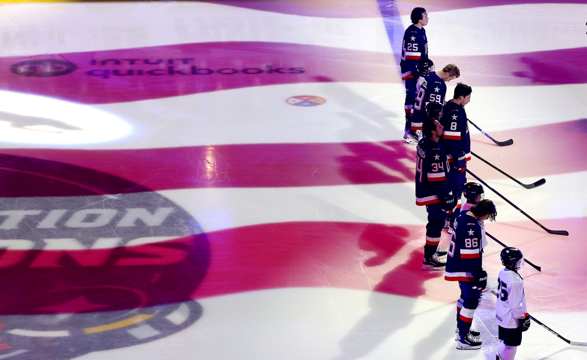 MONTREAL, QUEBEC - FEBRUARY 13: (Top-Bottom) Charlie McAvoy #25, Jake Guentzel #59, Zach Werenski #8, Auston Matthews #34 and Jack Hughes #86 of Team United States stand at their blueline during the singing of the United Sates national anthem before the 4 Nations Face-Off game between the United States and Finland at Bell Centre on February 13, 2025 in Montreal, Quebec. (Photo by Vitor Munhoz/4NFO/World Cup of Hockey via Getty Images)