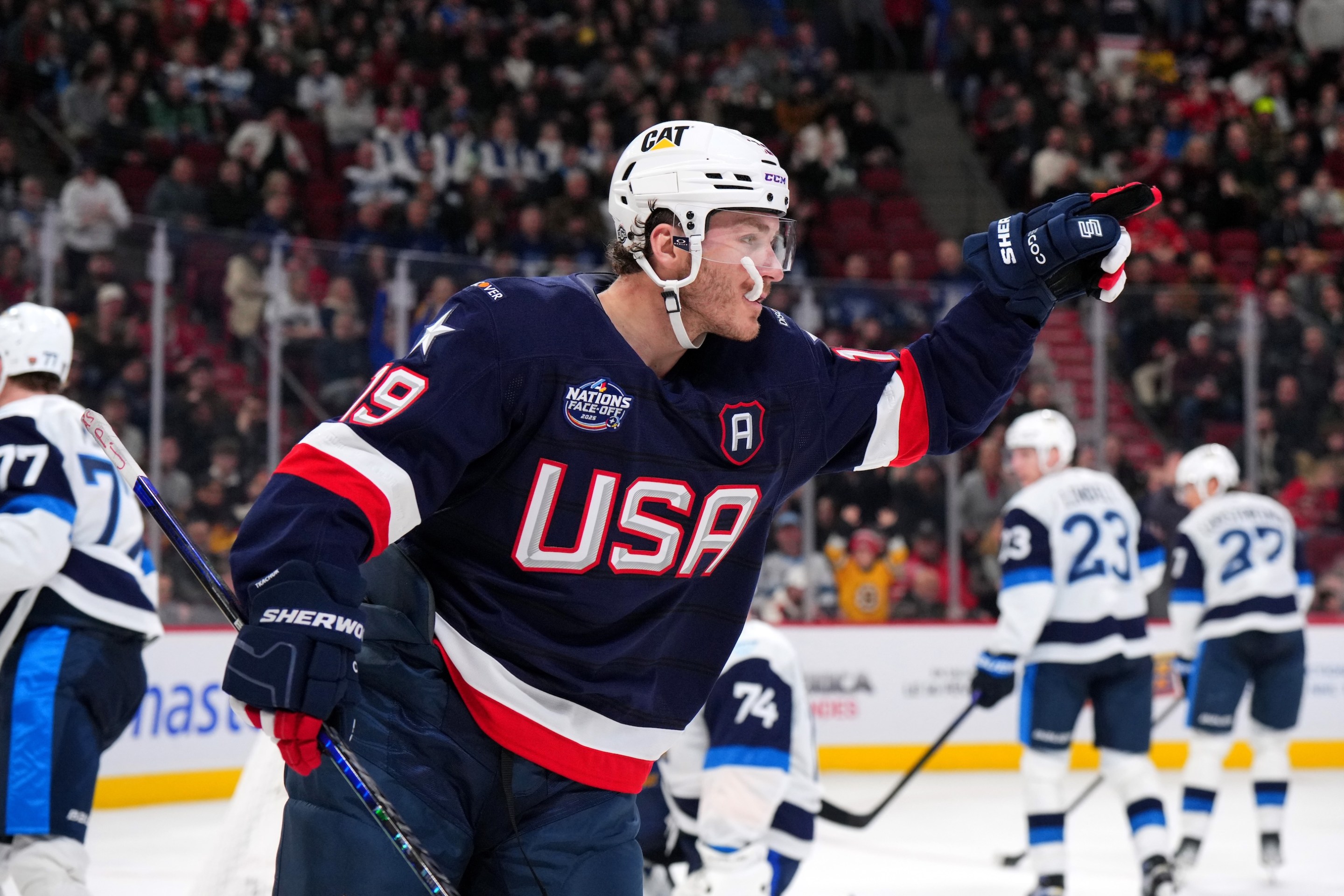 MONTREAL, QUEBEC - FEBRUARY: Matthew Tkachuk #19 of Team United States points to a teammate after scoring his second goal of the third period against Juuse Saros #74 of Team Finland during the 4 Nations Face-Off game between the United States and Finland at Bell Centre on February 13, 2025 in Montreal, Quebec. (Photo by Andre Ringuette/4NFO/World Cup of Hockey via Getty Images)