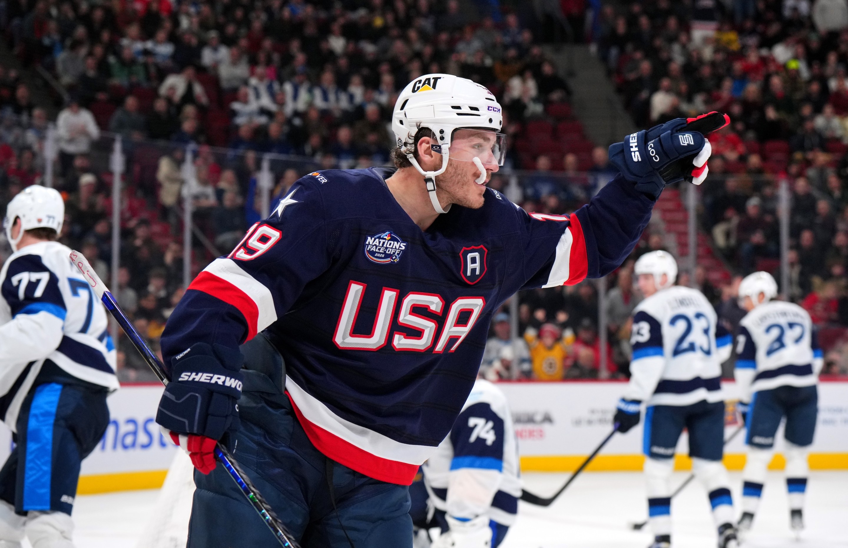 MONTREAL, QUEBEC - FEBRUARY: Matthew Tkachuk #19 of Team United States points to a teammate after scoring his second goal of the third period against Juuse Saros #74 of Team Finland during the 4 Nations Face-Off game between the United States and Finland at Bell Centre on February 13, 2025 in Montreal, Quebec. (Photo by Andre Ringuette/4NFO/World Cup of Hockey via Getty Images)