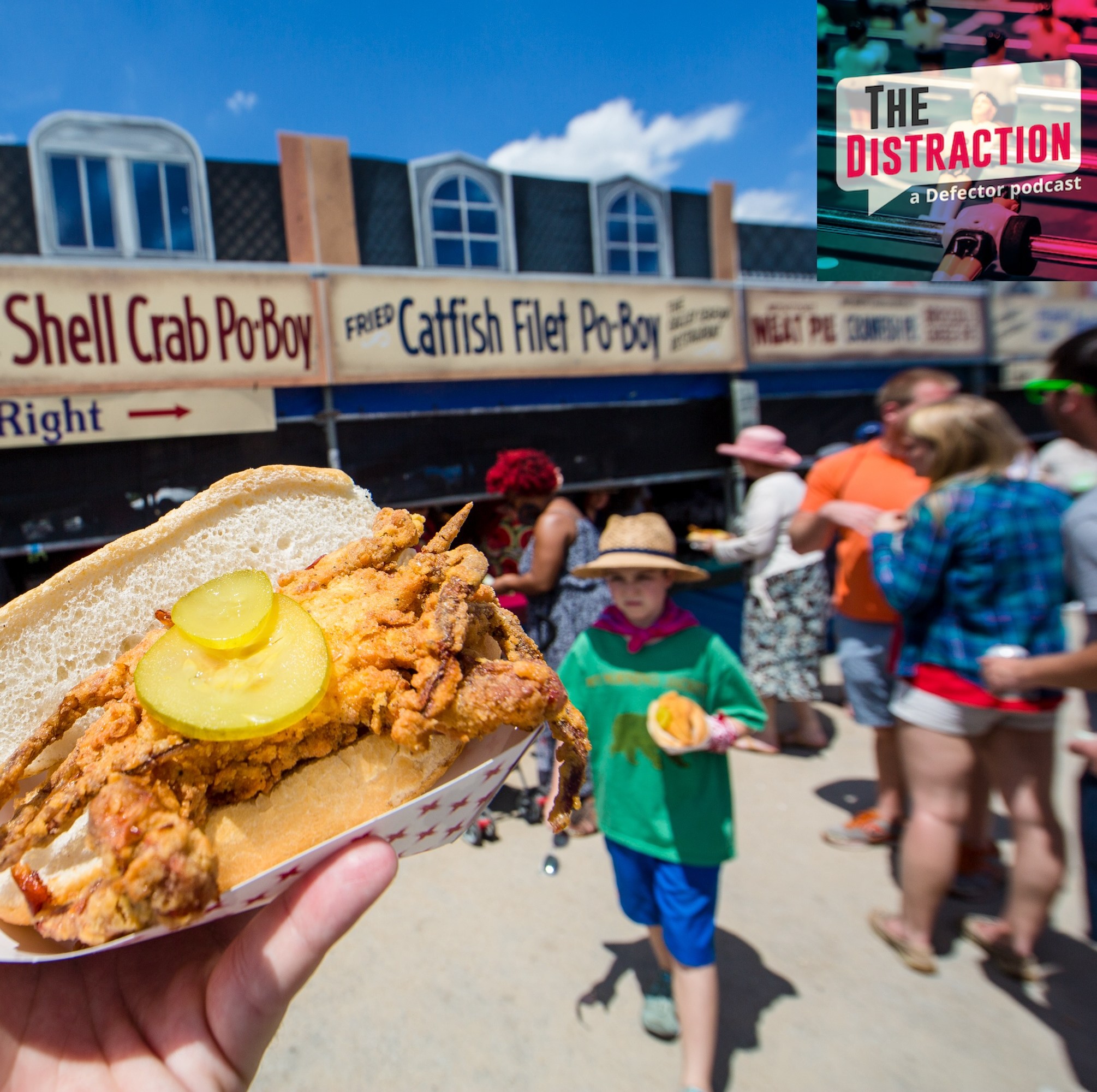 A general view of the atmosphere at the New Orleans Jazz & Heritage Festival at Fair Grounds Race Course on April 24, 2016 in New Orleans, with a fried crab po'boy front and center.