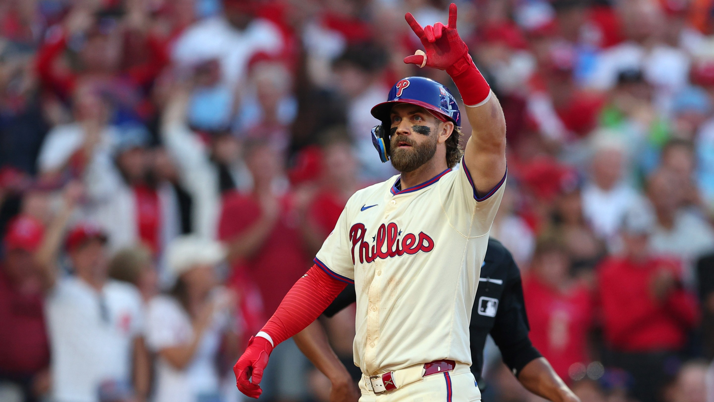 Bryce Harper #3 of the Philadelphia Phillies celebrates after hitting a two-run home run during the sixth inning against the New York Mets in Game Two of the Division Series at Citizens Bank Park on October 06, 2024 in Philadelphia, Pennsylvania.