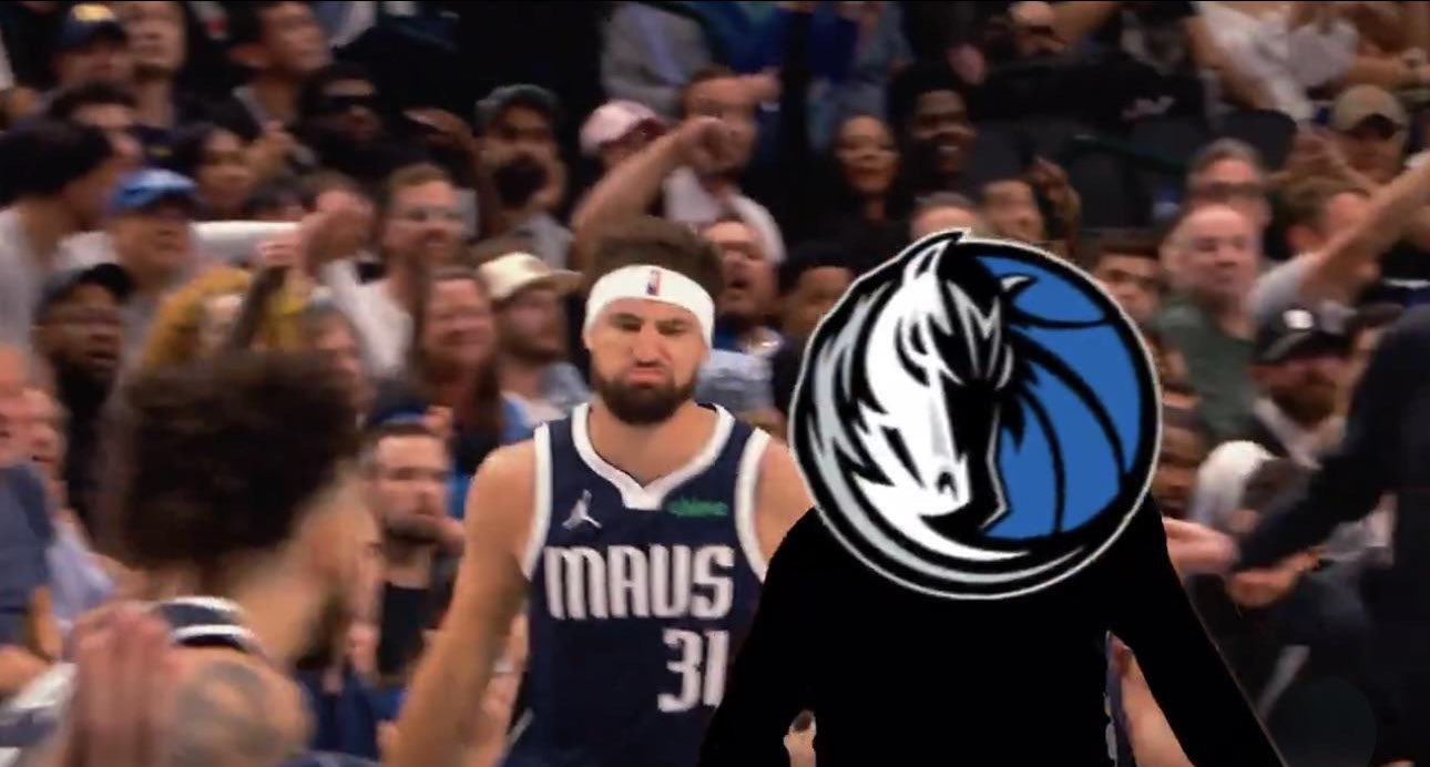 Klay Thompson making the stink-face after hitting a three, being congratulated by an erased visual vacuum shaped exactly like Luka Doncic and with a Mavs logo where his head should be, in a frame from a since-deleted Mavericks hype video.