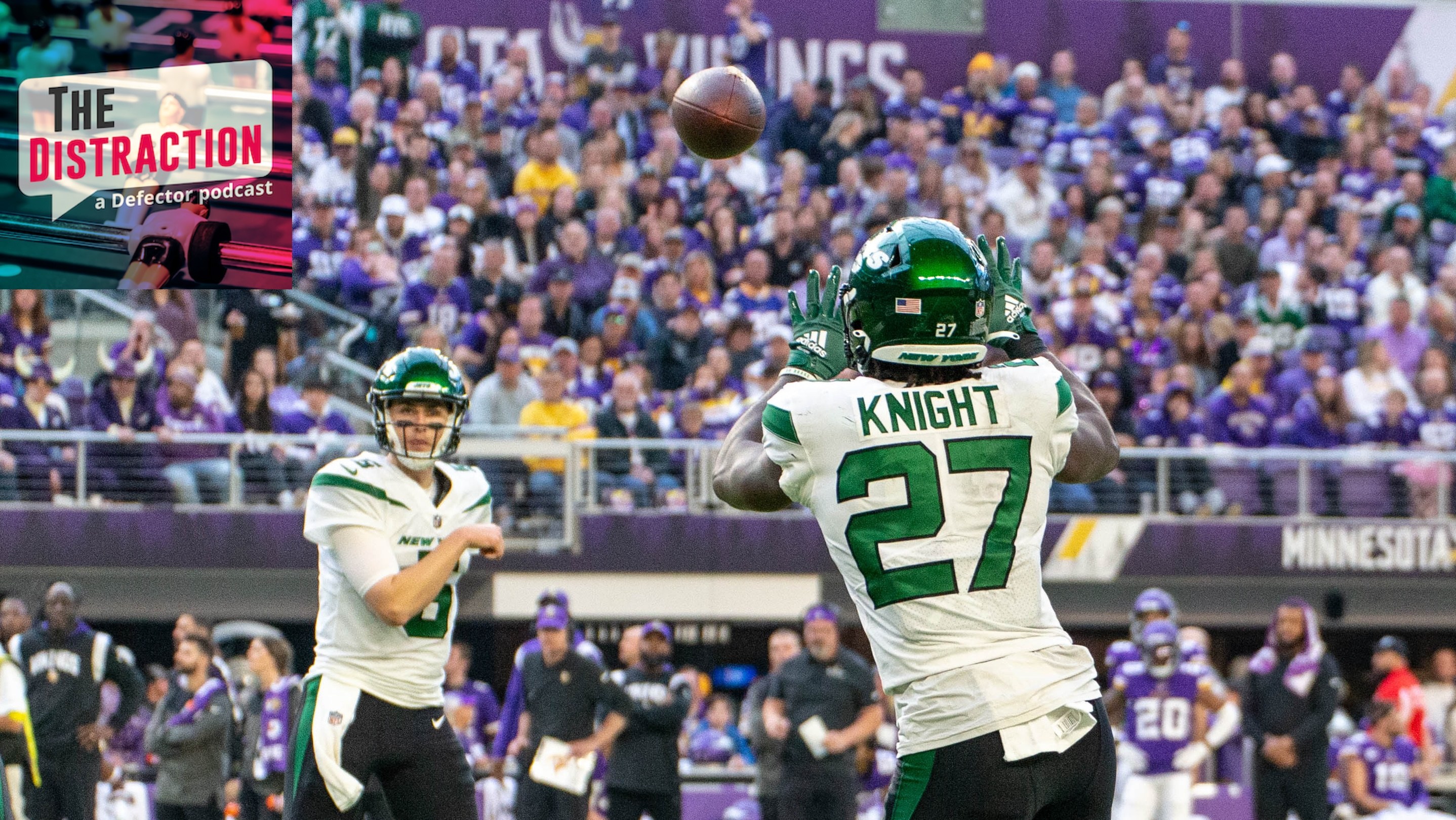 New York Jets running back Zonovan Knight (27) catches a pass from New York Jets quarterback Mike White (5) during the NFL game between the New York Jets and the Minnesota Vikings on December 4th, 2022.