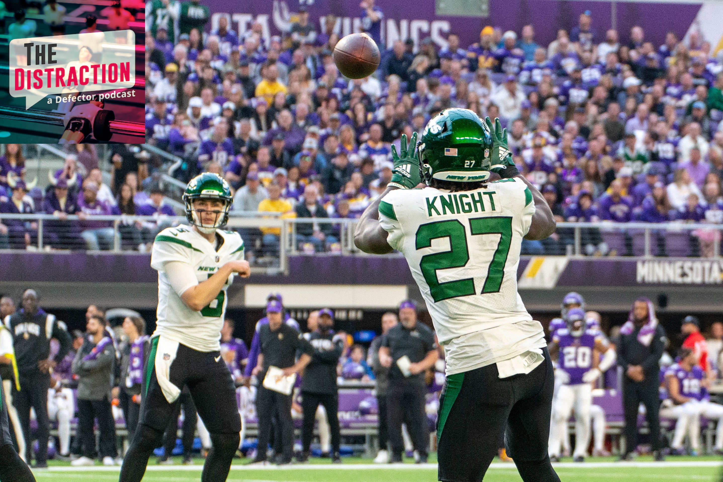 New York Jets running back Zonovan Knight (27) catches a pass from New York Jets quarterback Mike White (5) during the NFL game between the New York Jets and the Minnesota Vikings on December 4th, 2022.