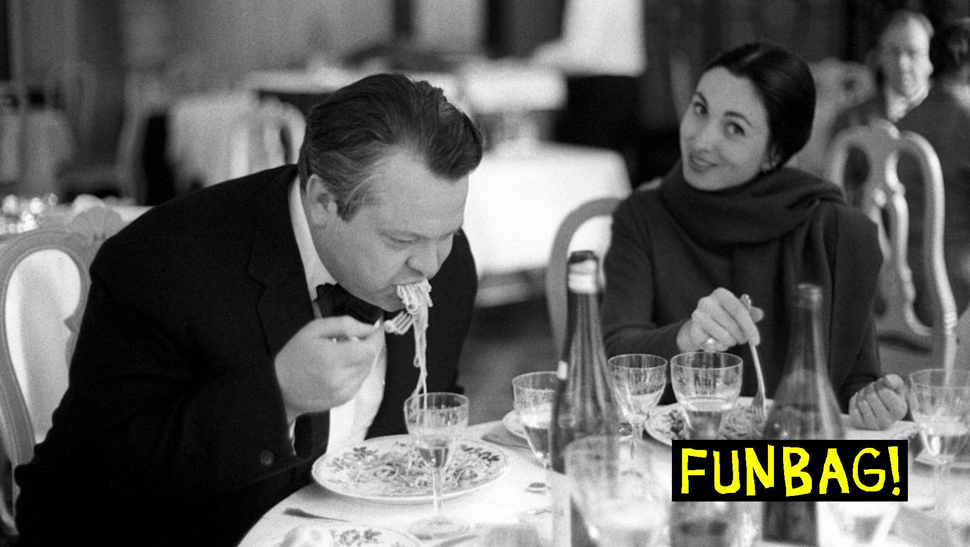 Orson Welles And Paola Mori Having Lunch At Table