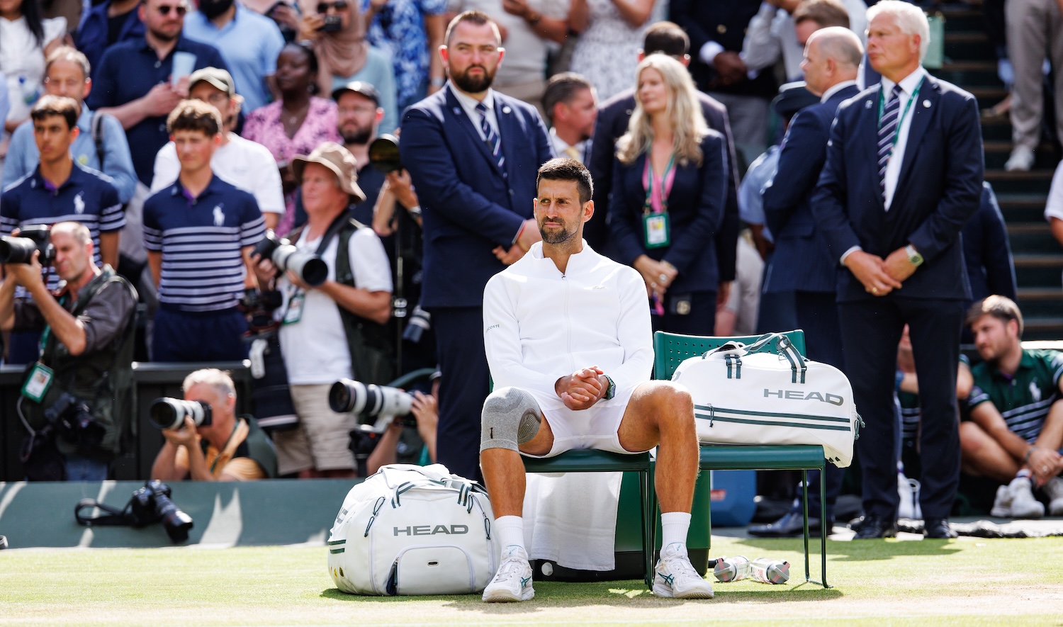 LONDON, ENGLAND - JULY 14: Novak Djokovic of Serbia waits for the trophy presentation after his defeat by Carlos Alcaraz of Spain in the final of the men's singles, during day fourteen of The Championships Wimbledon 2024 at All England Lawn Tennis and Croquet Club on July 14, 2024 in London, England. (Photo by Frey/TPN/Getty Images)