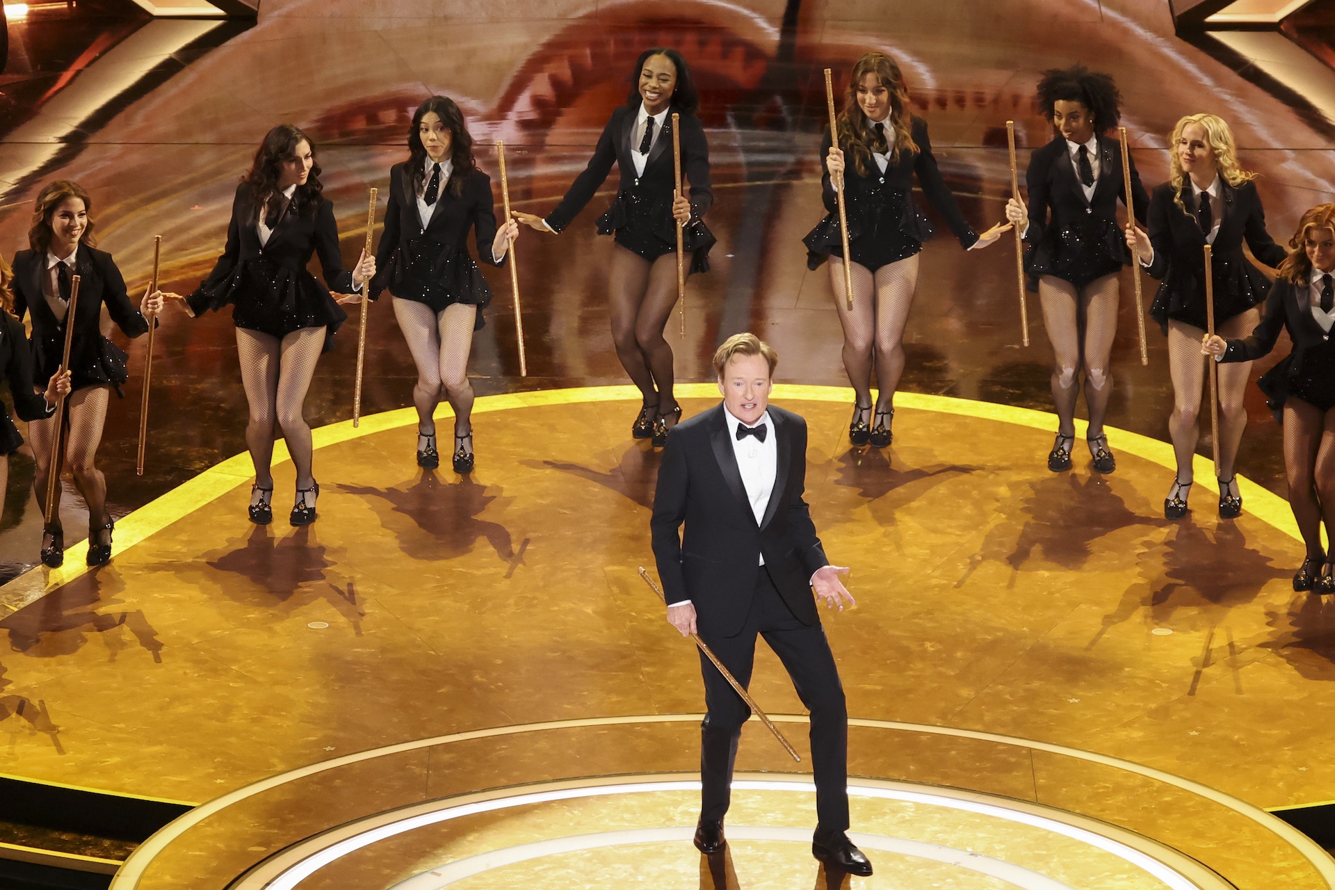 Conan O'Brien on stage hosting the Oscars.